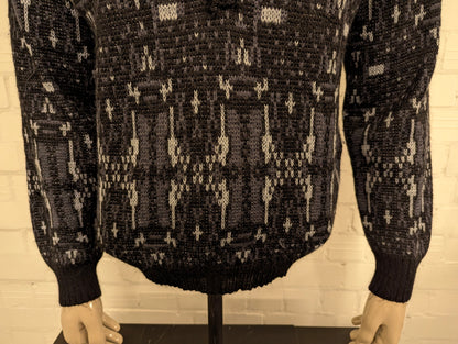 Vintage Genti S Wollen polo trui. Grijs zwart motief. Maat M.