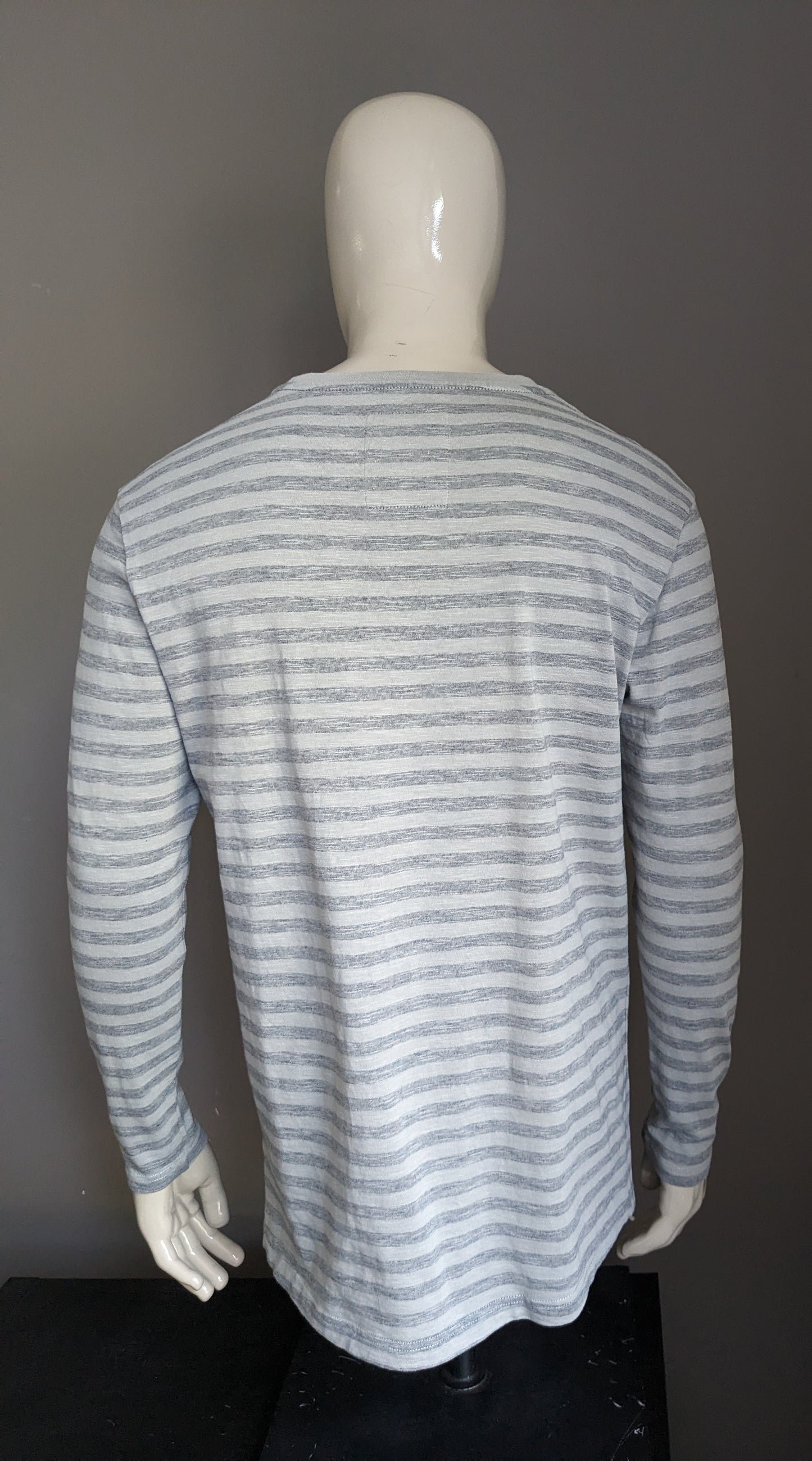 Pull mince brut G-Star. Rayé gris. Taille L.