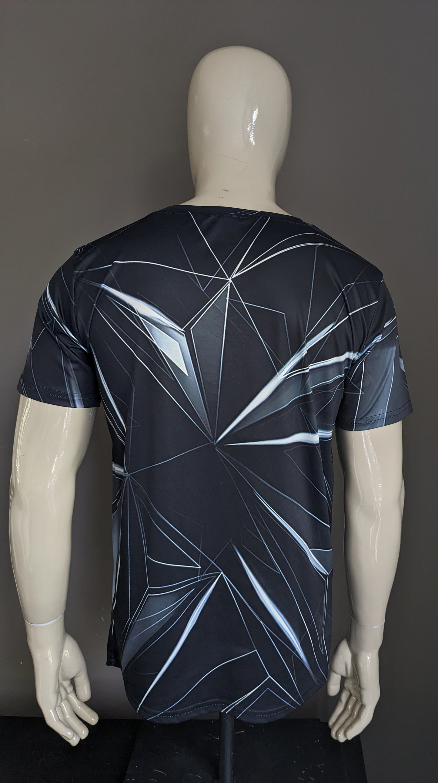 Geometric print shirt. Zwart Wit gekleurd. Maat M. stretch.