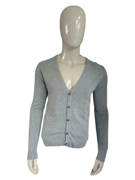 Vestimiento de H & M con botones. Color gris. Talla M