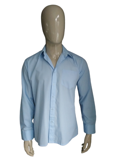 West Side Shirt. Hellblau gefärbt. Größe 40 /m - L.