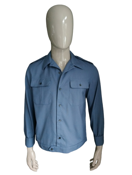 Vintage 70's overhemd met puntkraag. Blauw gekleurd. Maat L.