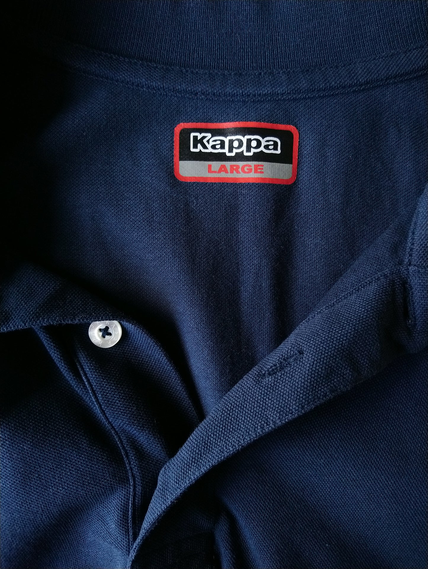 Kappa Polo. Color azul oscuro. Talla L.
