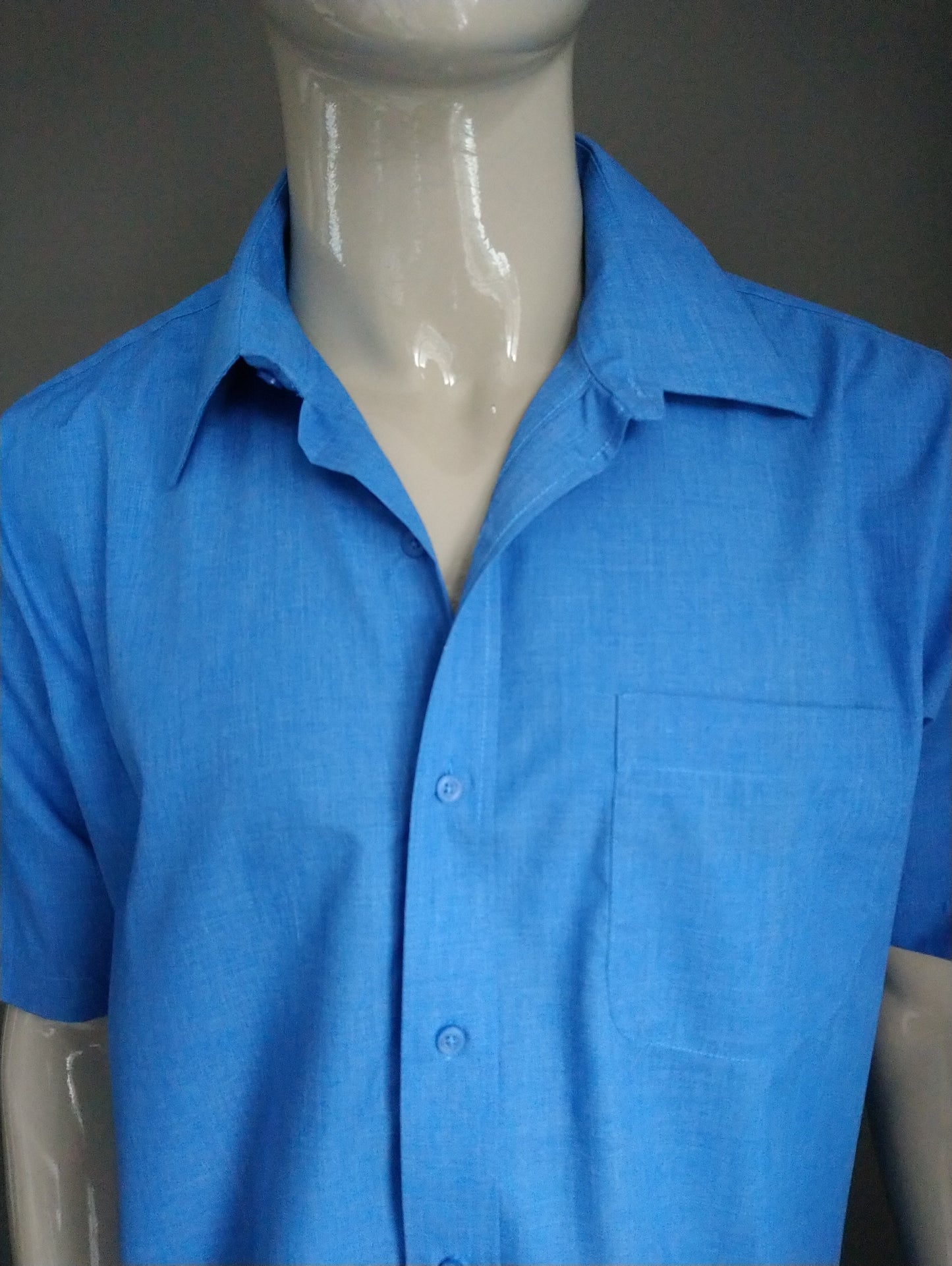 Manica corta della camicia George. Colorato blu. Taglia XL.