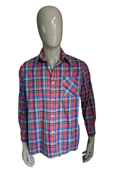 Vintage-Hemd aus den 70ern mit spitzem Kragen. Rosa Blau Schwarz kariert. Größe XL.