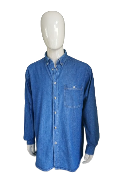 Grande chemise en pierre vintage du denim. Couleur bleu foncé. Taille xl.