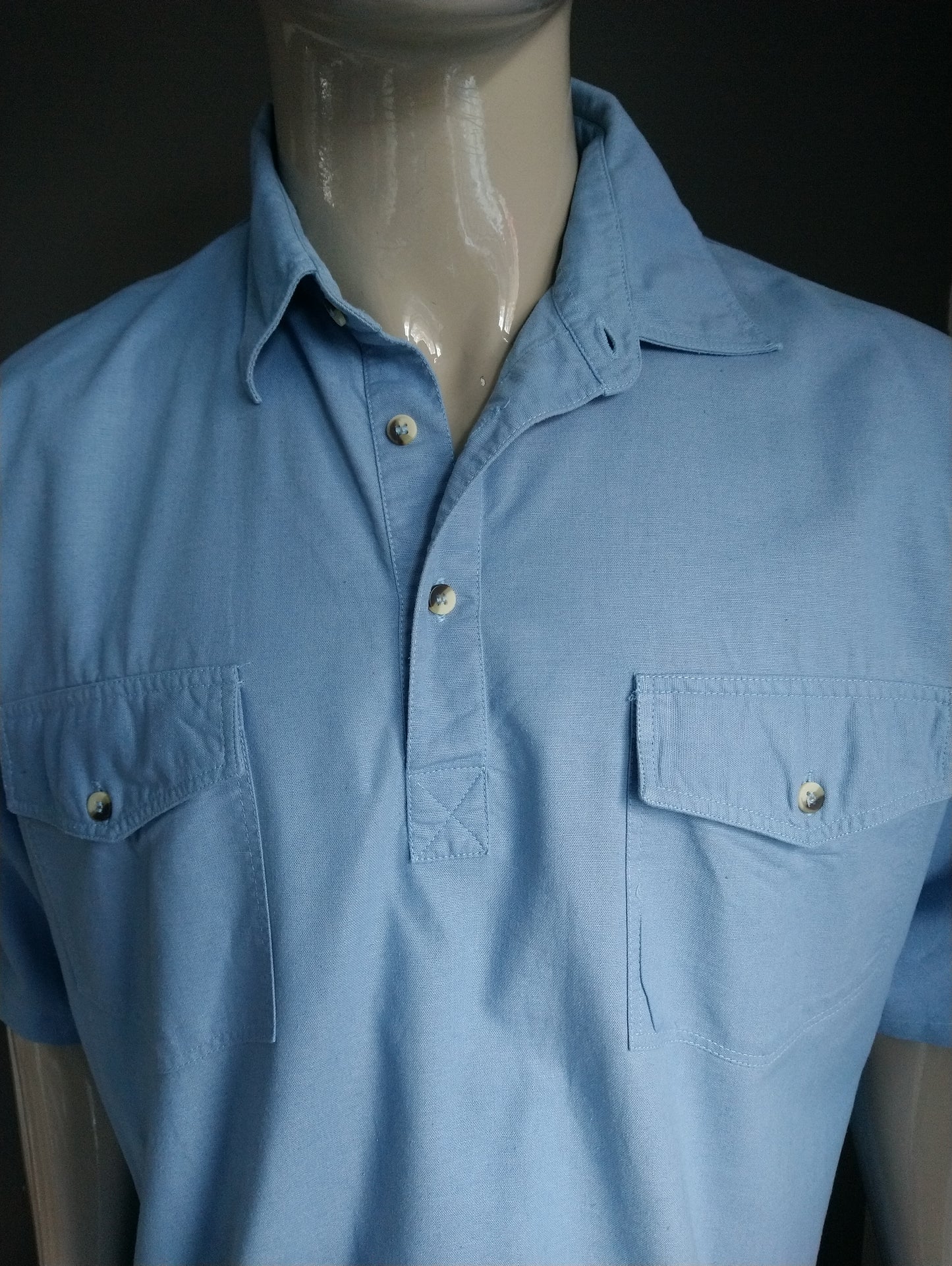 Vintage C&A Polo with elastic band. Light blue colored. Size XL / XXL - 2XL.