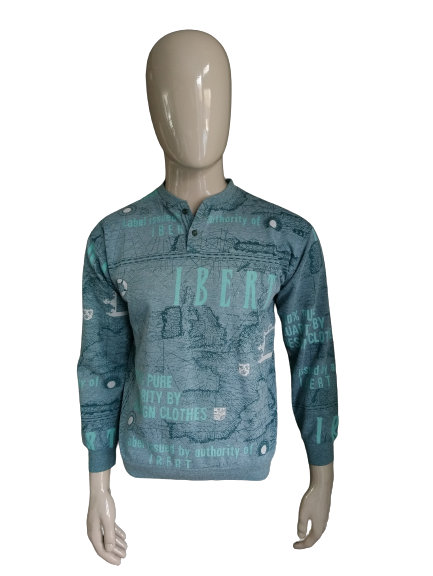 Vintage-Pullover mit Knöpfen. Grüner Aufdruck. Größe M.