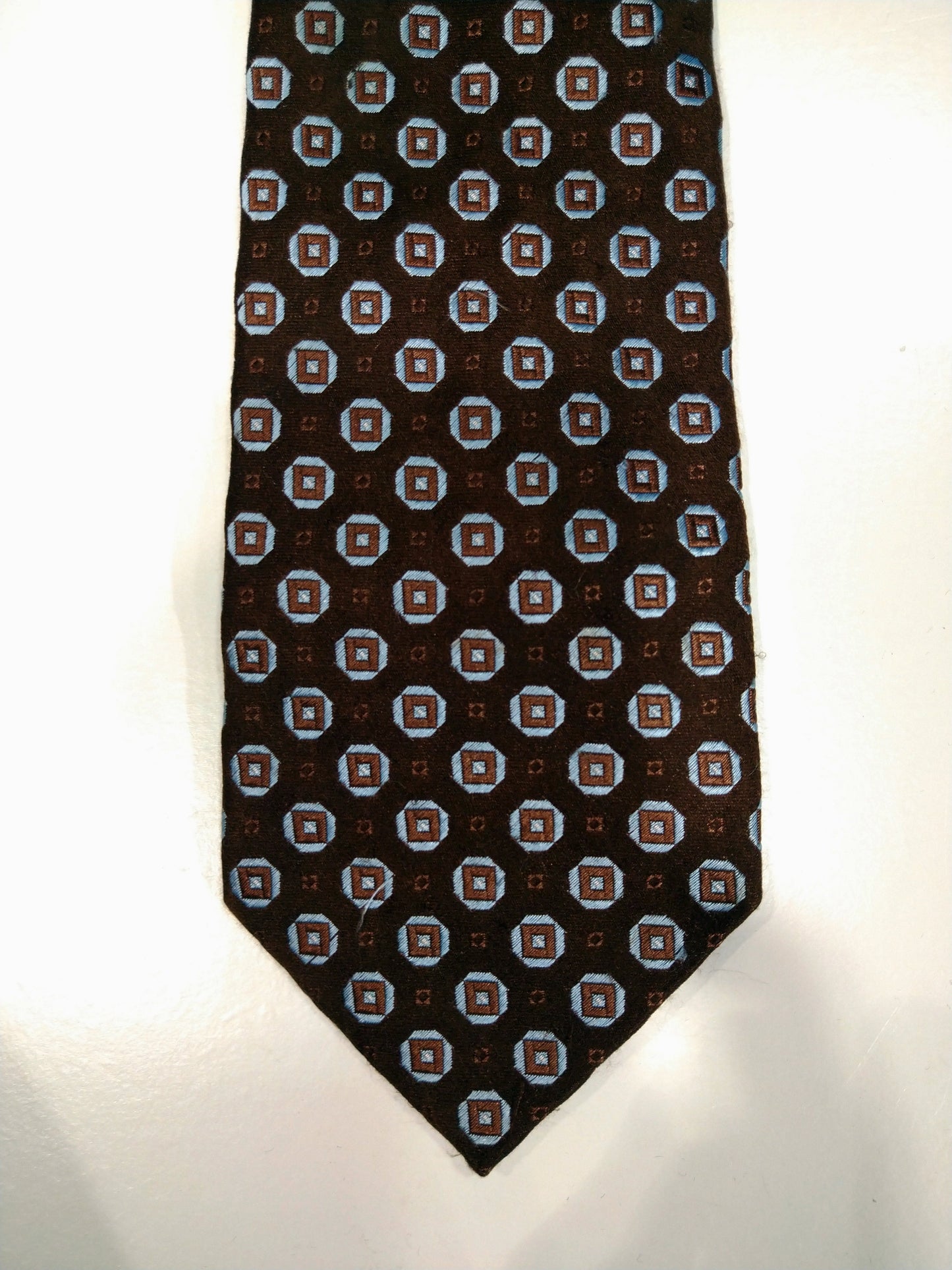 Olymp zijde stropdas. Bruin met wit motief.