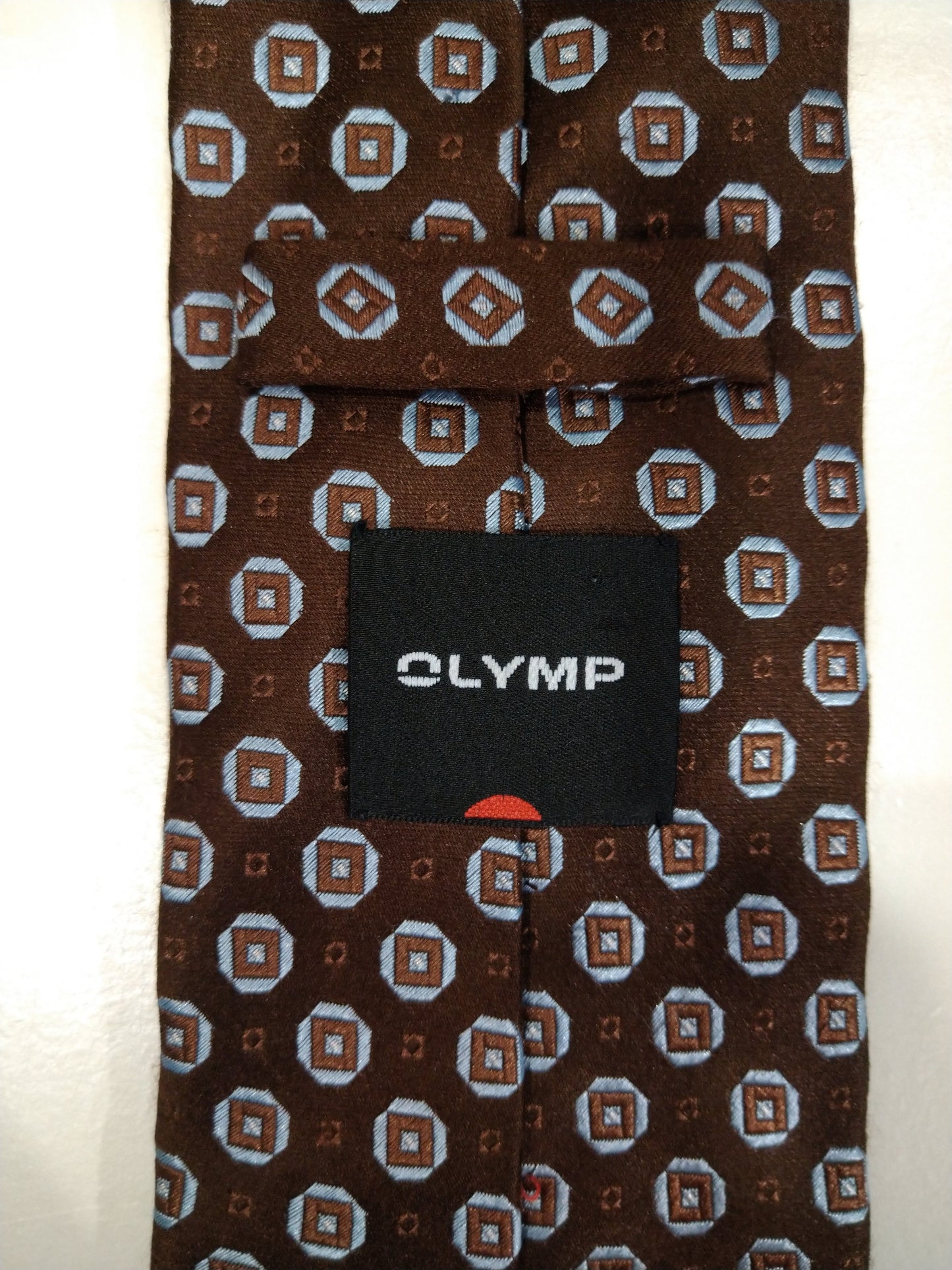 Olymp Silk Tie. Marrón con motivo blanco.