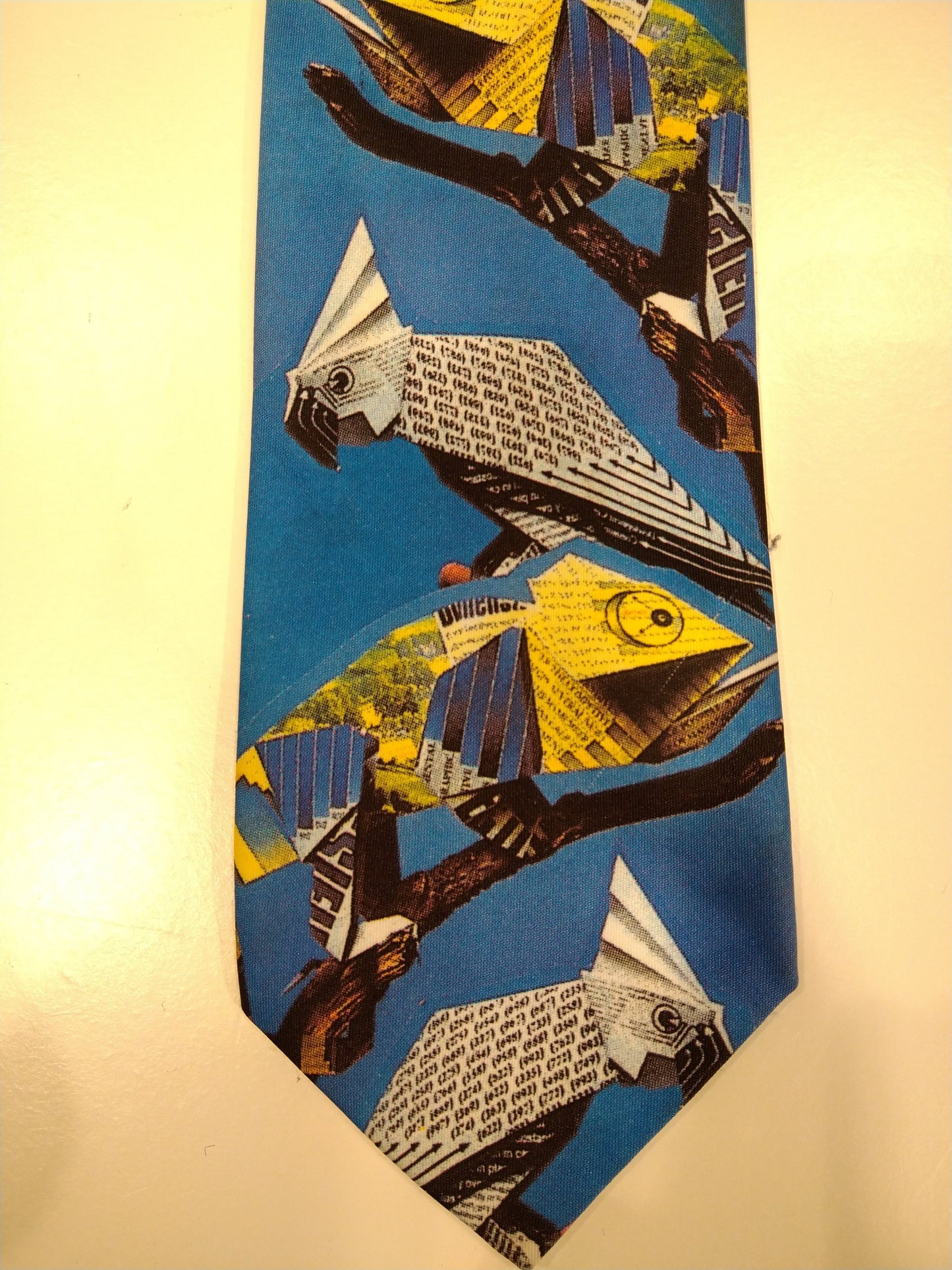 Vintage Rooymans Specials tie. Blue with chameleon / parrot motif.