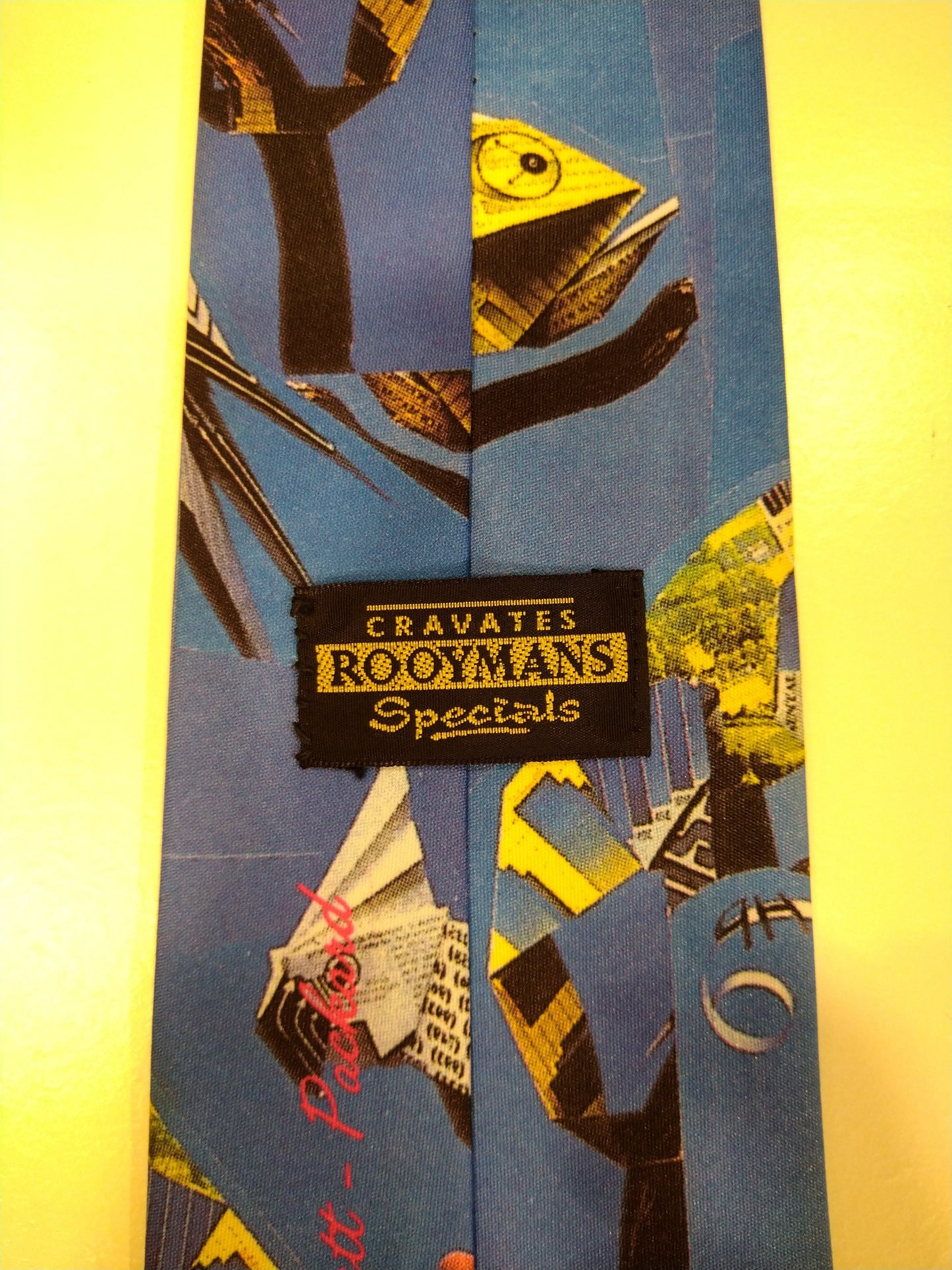 Vintage Rooymans Specials stropdas. Blauw met kameleon / papagaai motief.