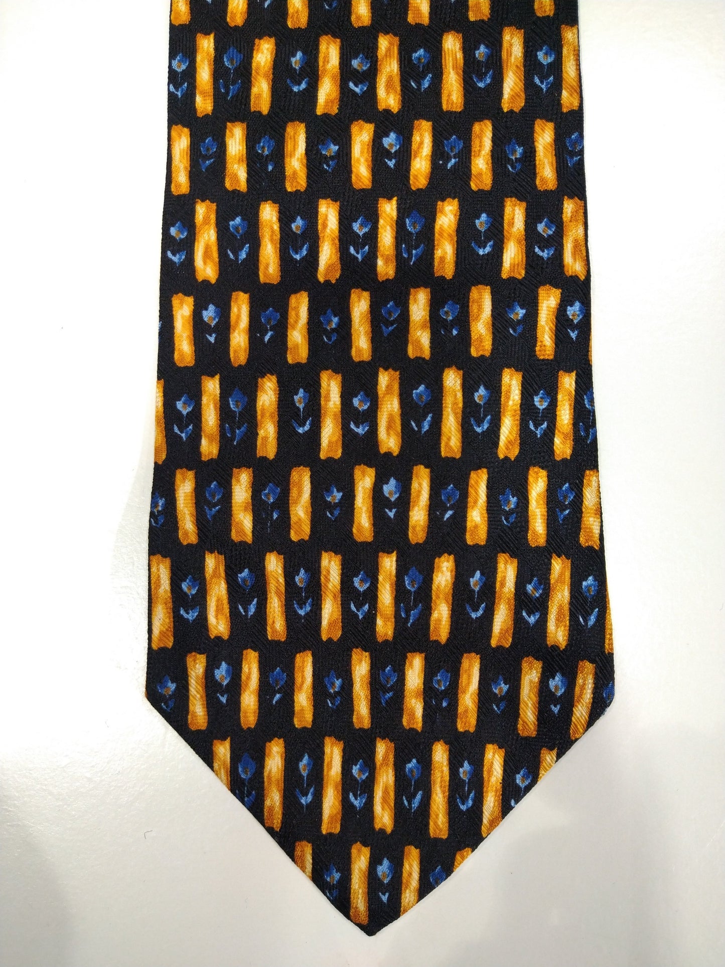 La corbata de seda de Hugo Boss vintage. Motif azul / negro / amarillo.