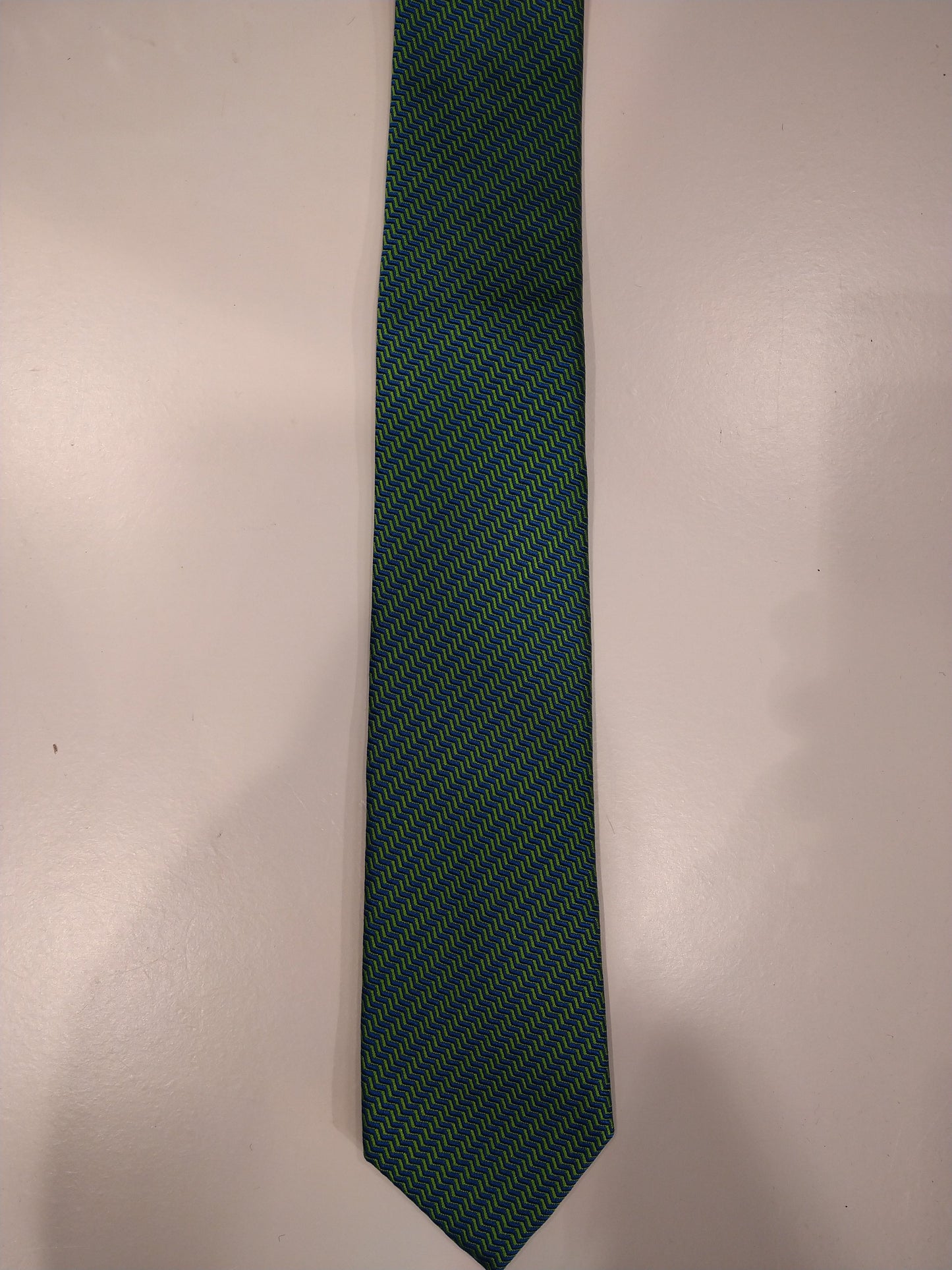 Max Goodman zijde stropdas. Groen met geel motief.
