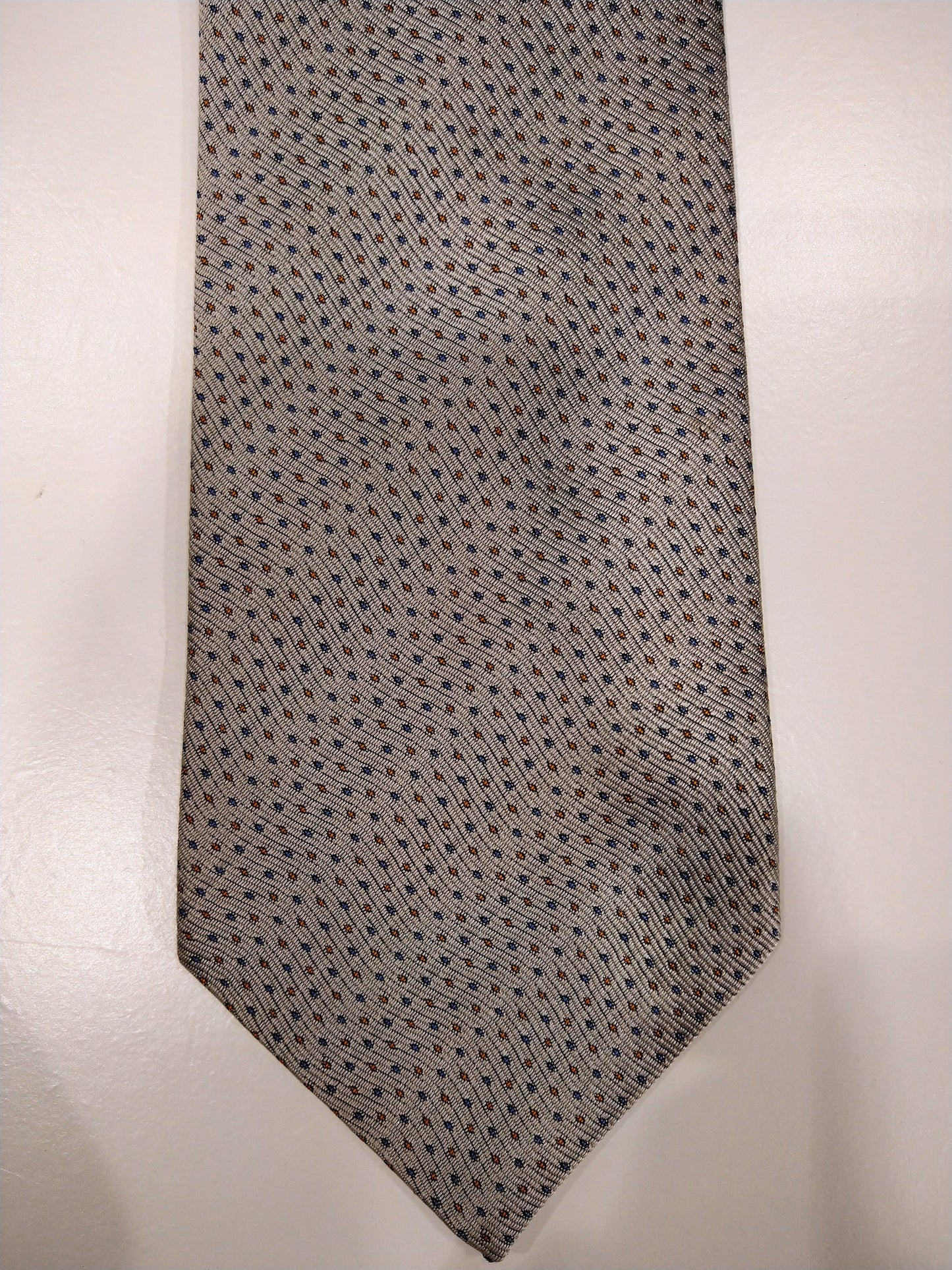 Cravate de design italienne x-o-x-o uomo. Beige avec motif de boules bleues / marron.