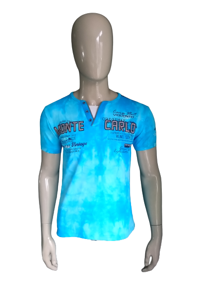 Camisa de violento con botones. Azul mezclado. Talla M.