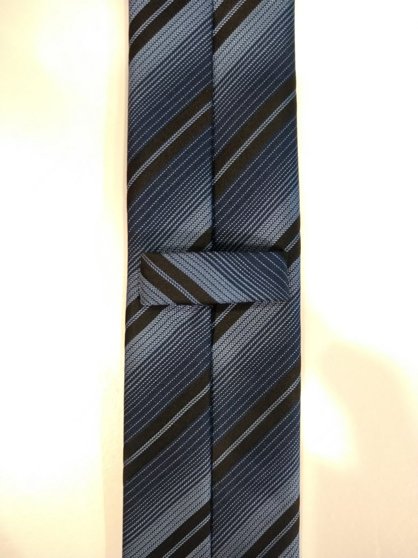 Cedar Wood State narrow polyester tie. Blue black striped.