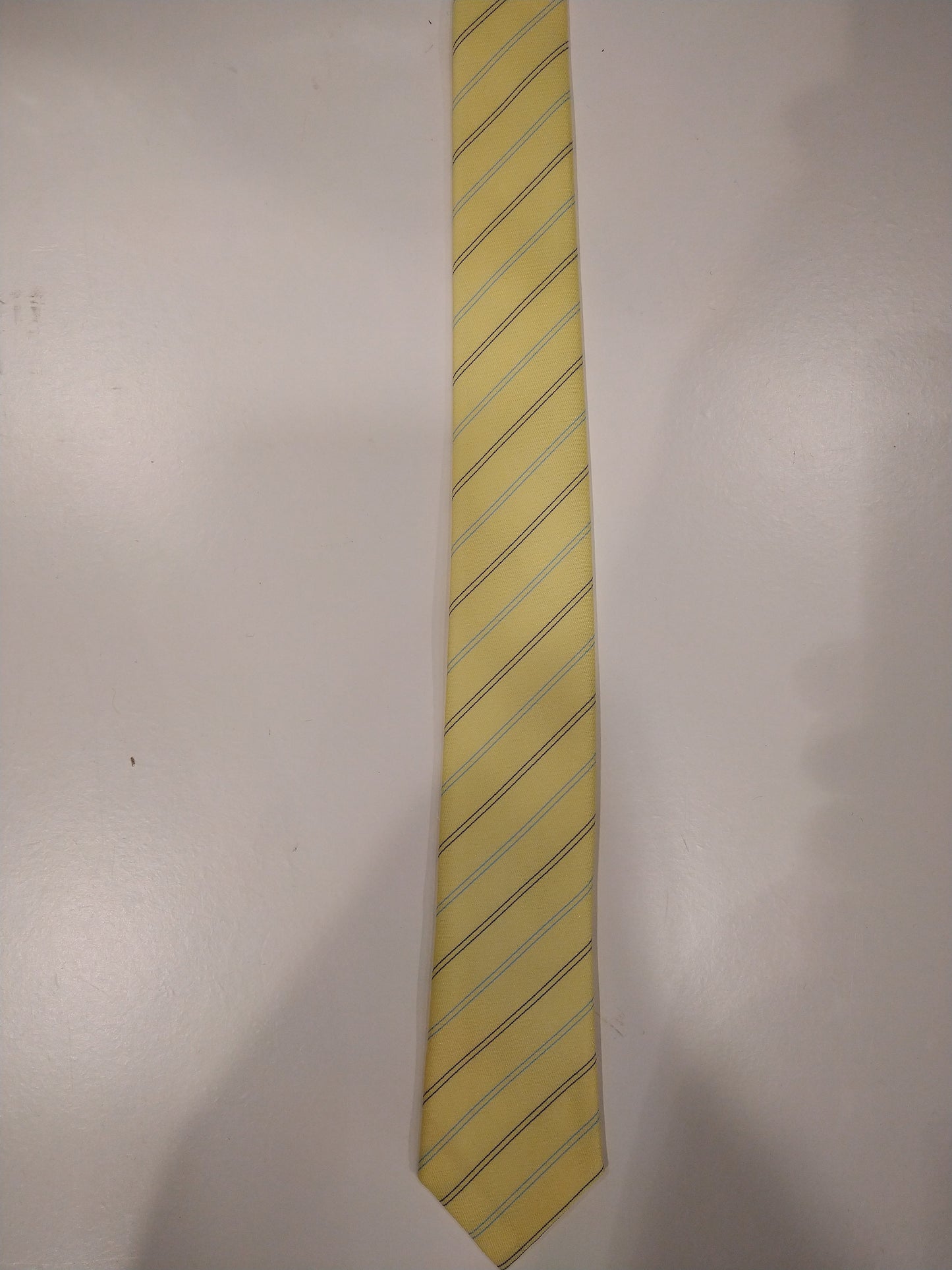 Fashion tie vintage extra narrow tie. Yellow blue black striped.