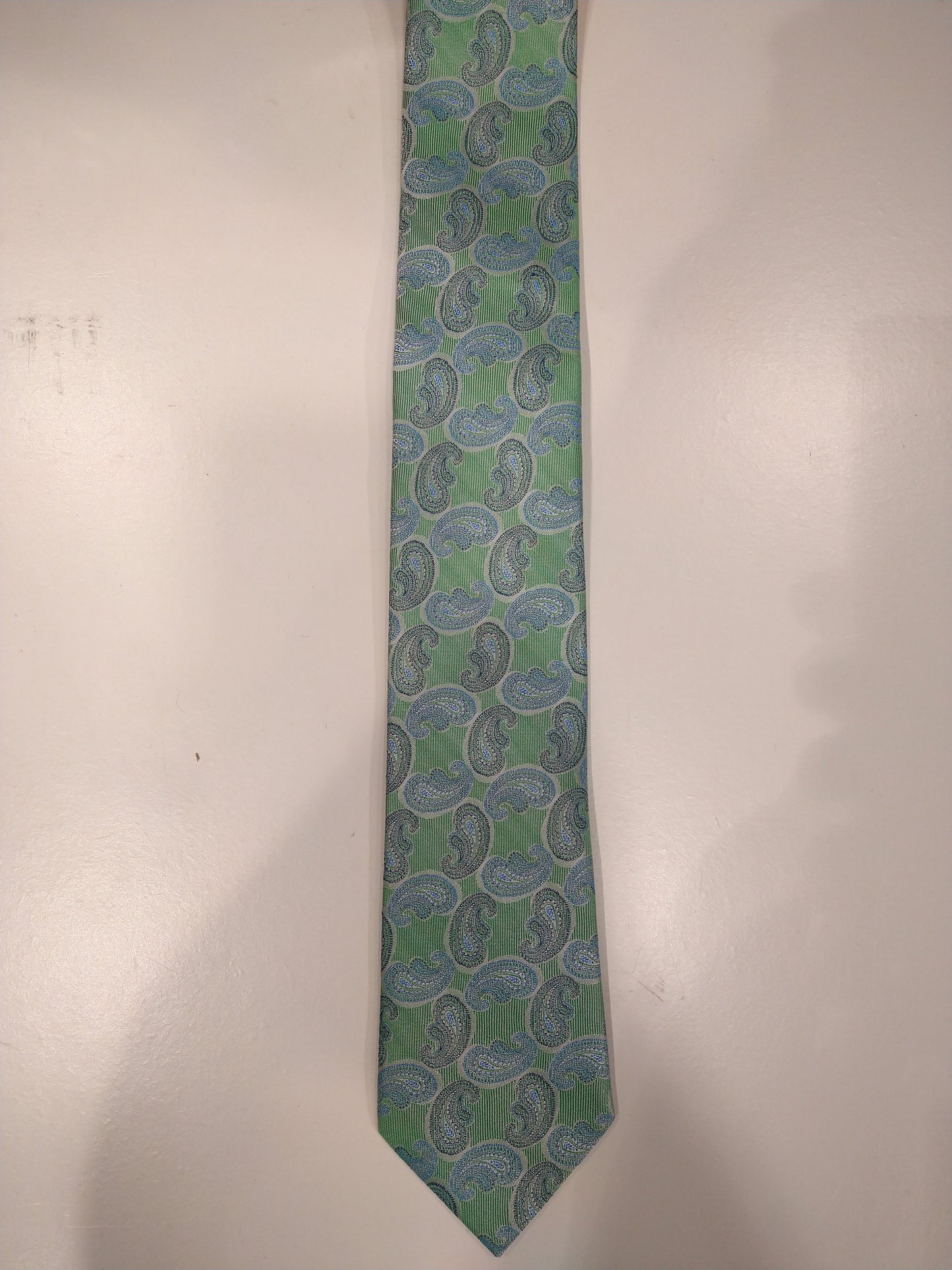Max Goodman silk tie. Blue green motif.