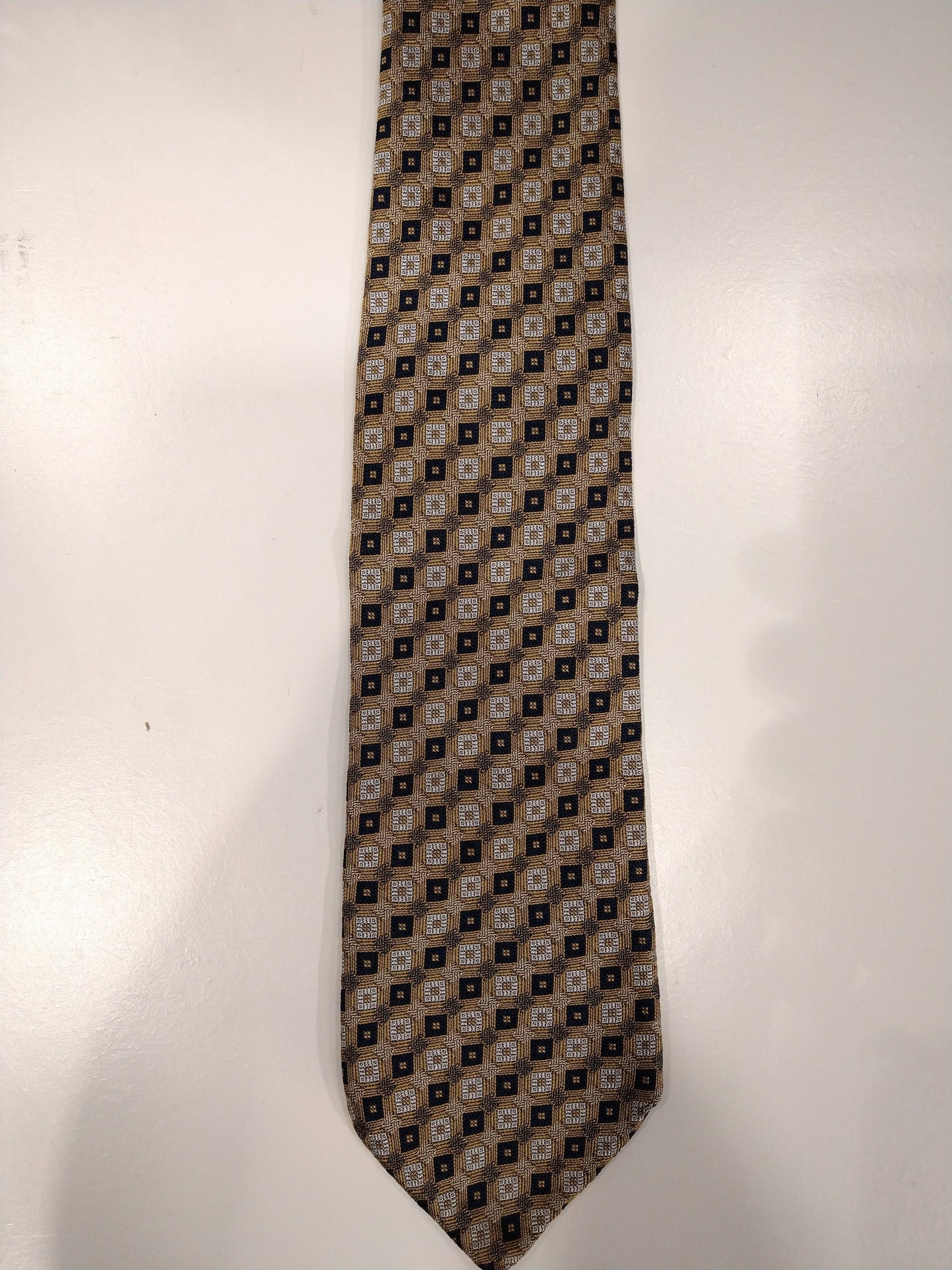 Bellafonte silk tie. Green brown motif