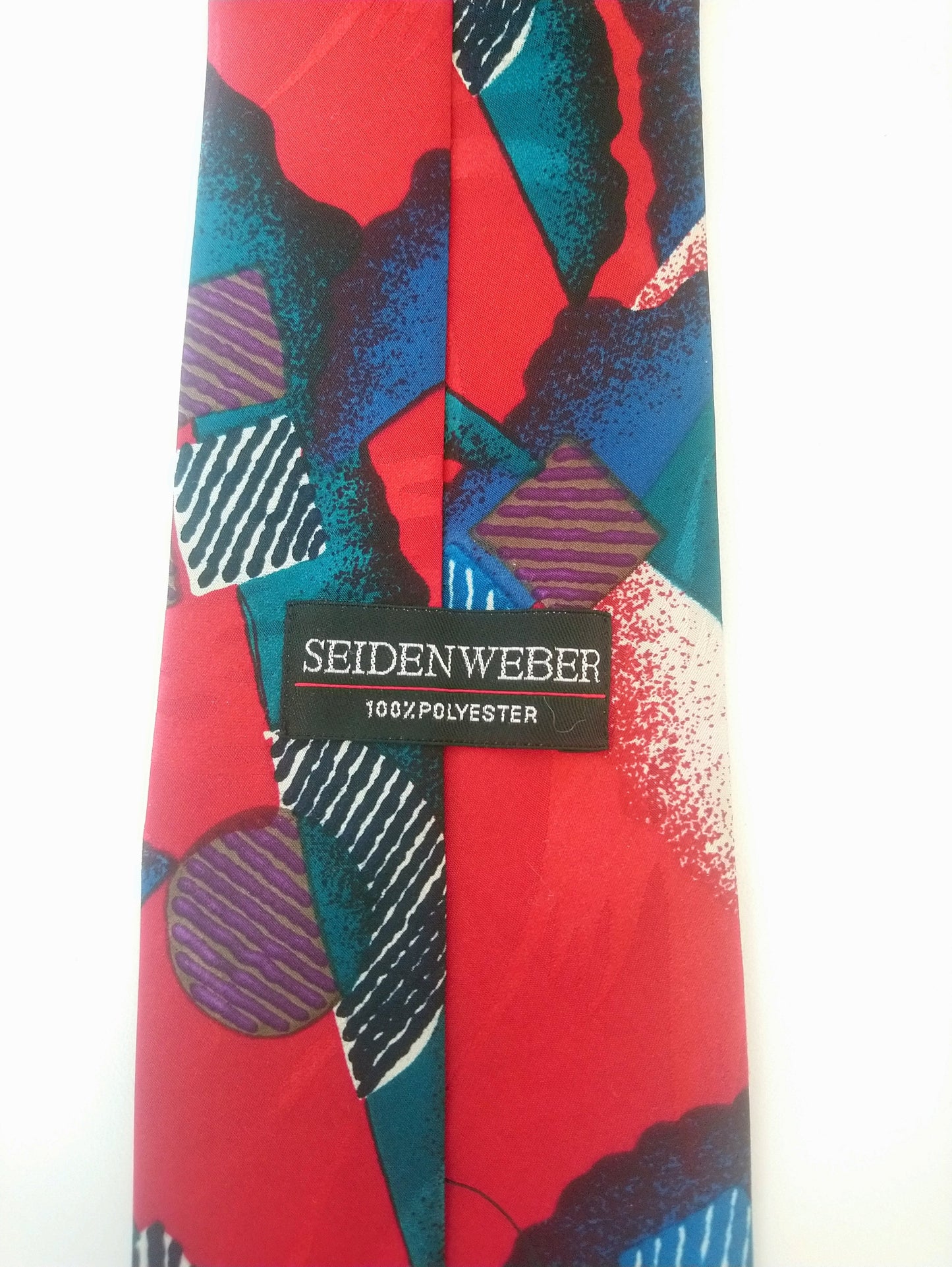 Vintage Seidenweber stropdas. Rood blauw motief. Polyester.
