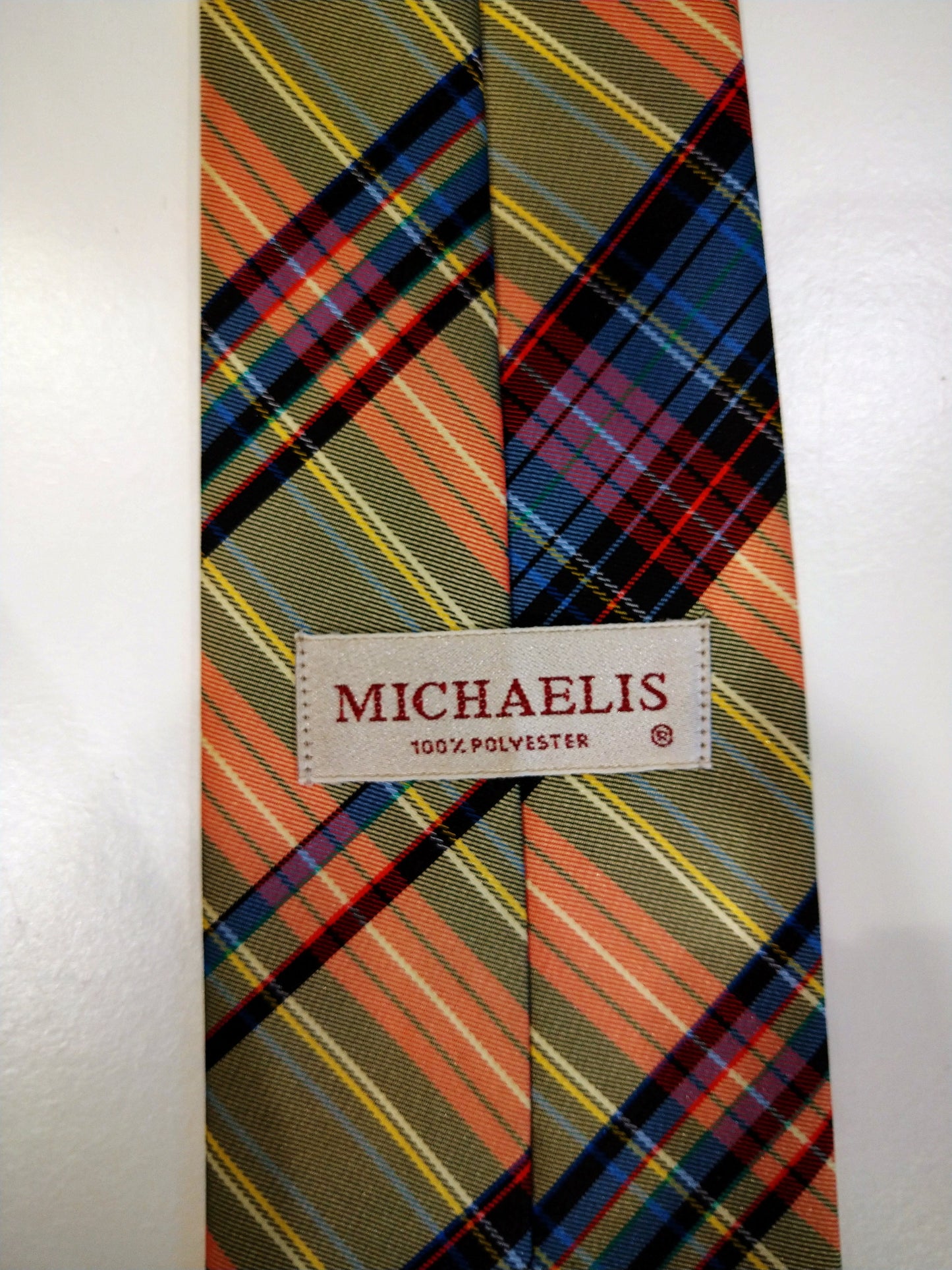 Kleurige Michaelis geruite polyester stropdas.