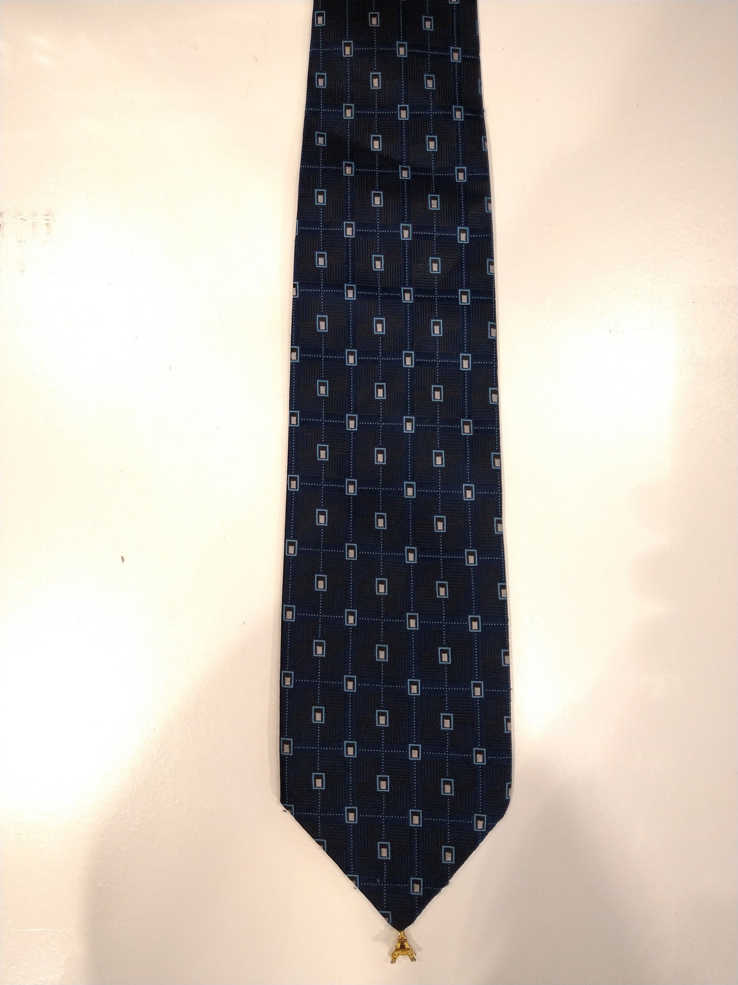 Separate haute couture wecon polyester tie. Blue motif with pendant Eiffel tower.