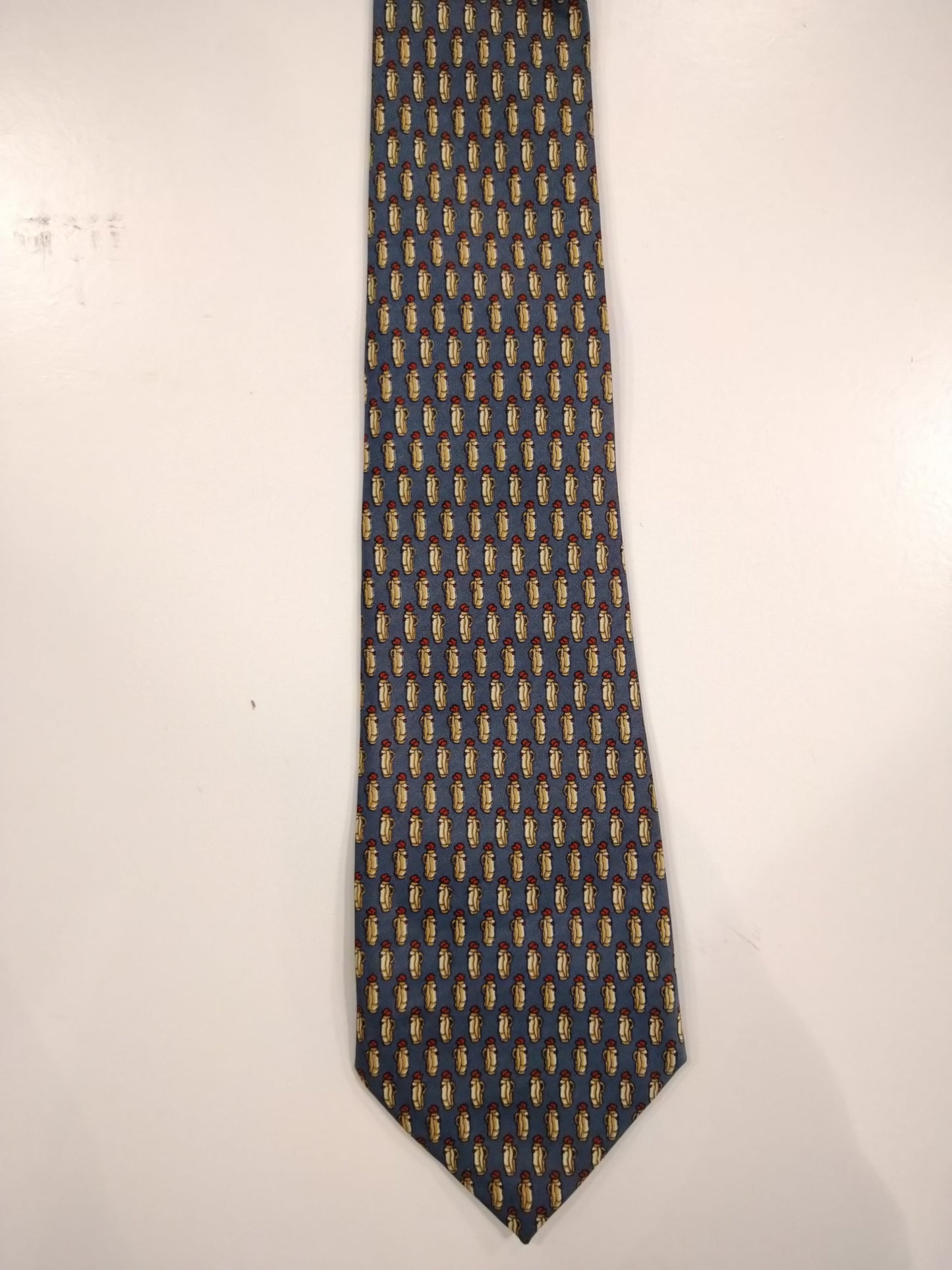 Sette & Belle Hand made silk tie. Gray yellow motif.