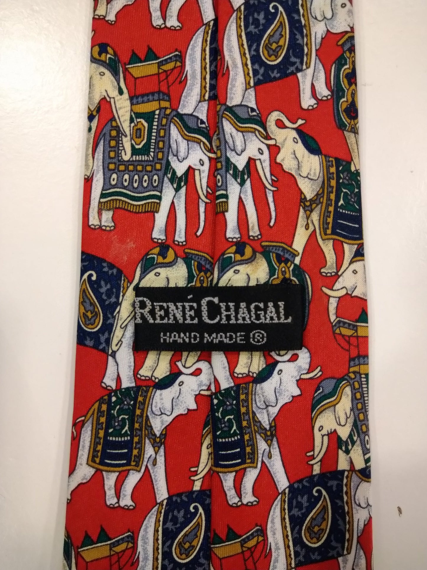 René Chagal Hand Made Silk Tie. Red elephant motif.