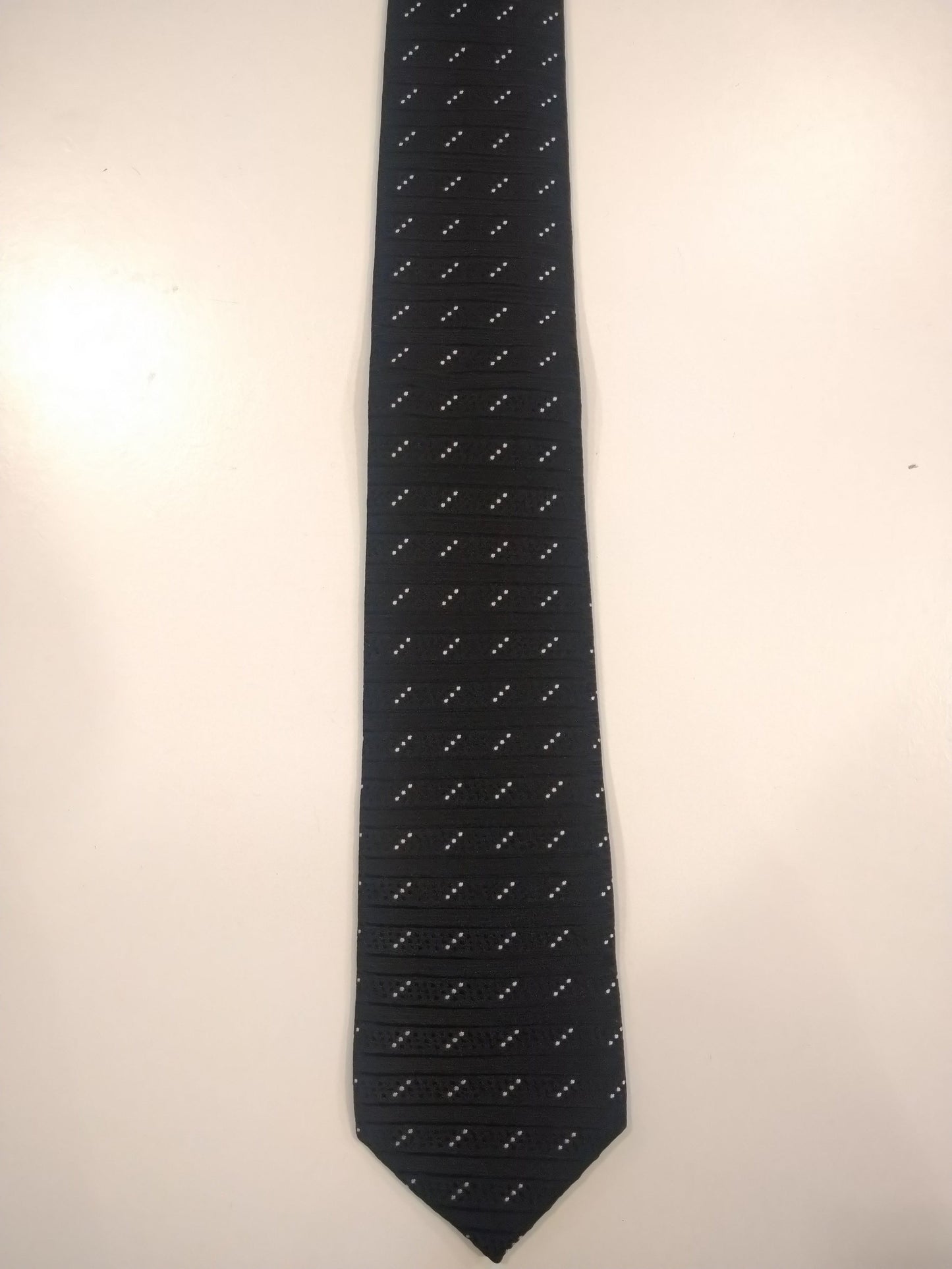 Dragon polyester tie. Black and white tangible motif.
