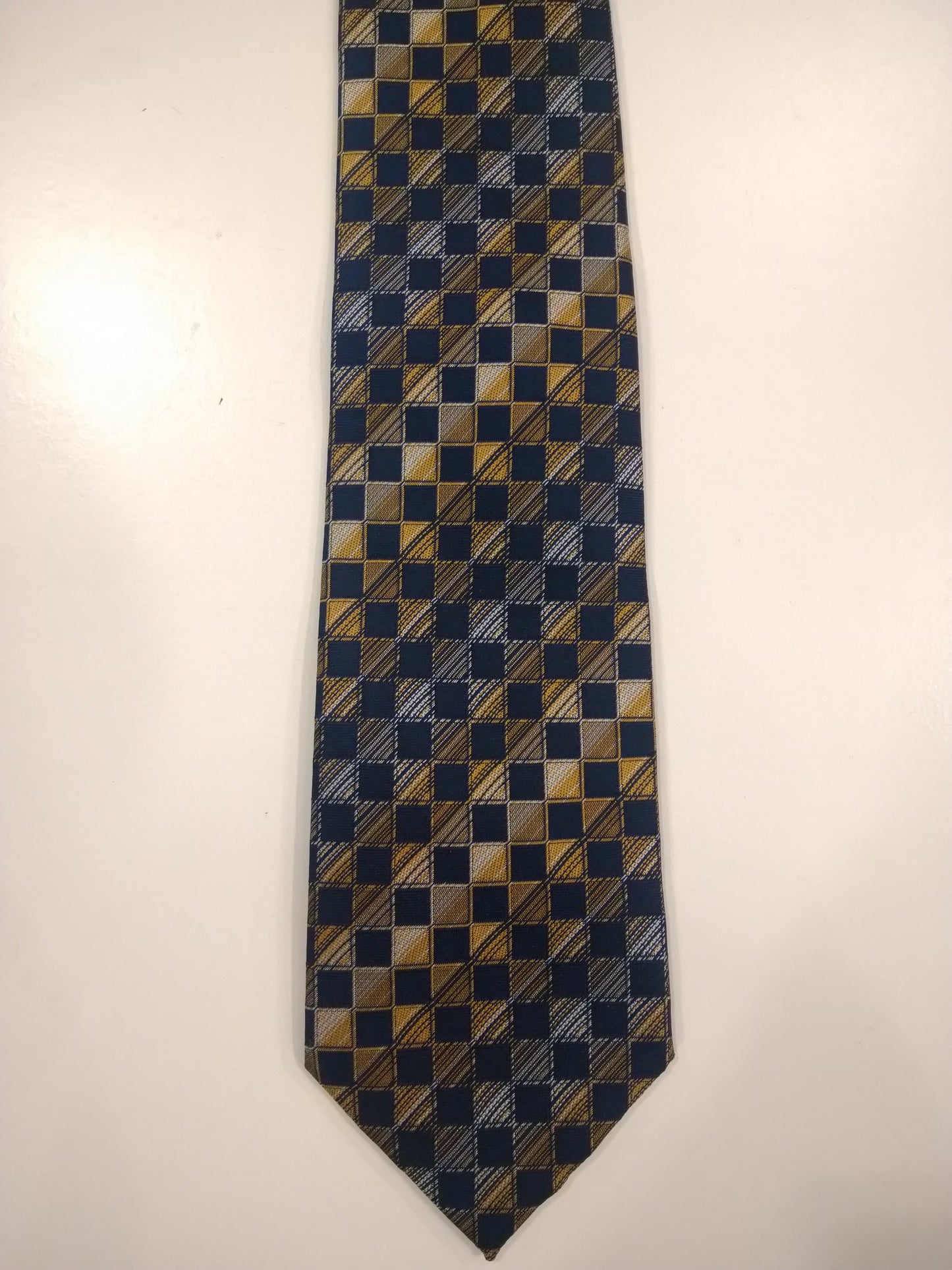 Skopes polyester tie. Separate blue gray yellow motif.