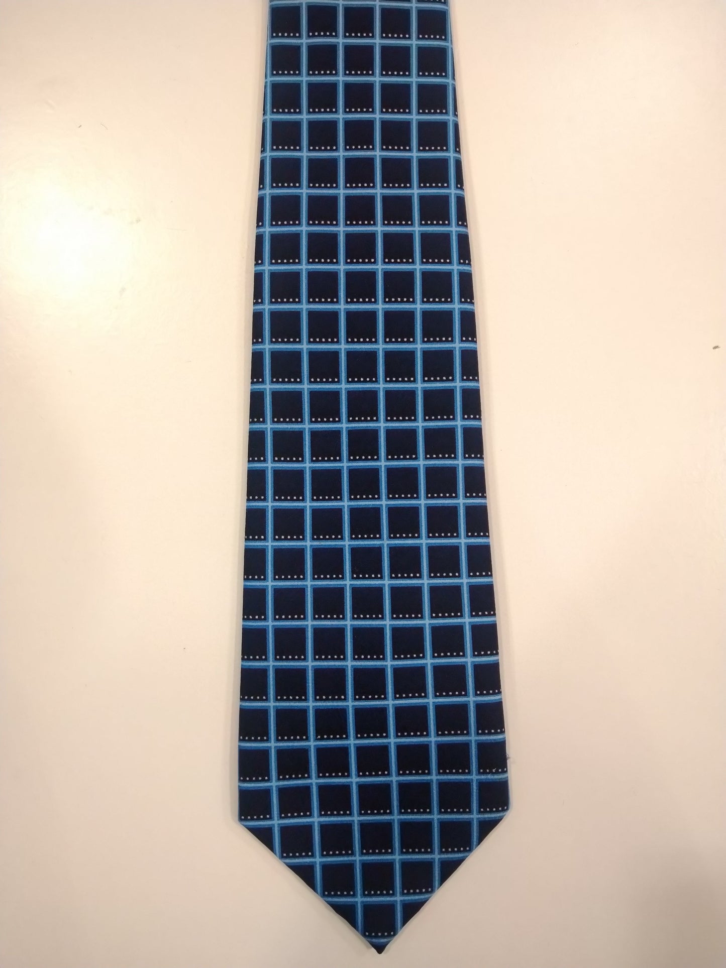Rael Brook Polyester tie. Blue square motif.