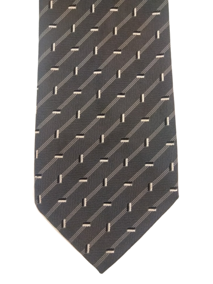 La corbata de poliéster de Montagu. Motivo blanco gris.