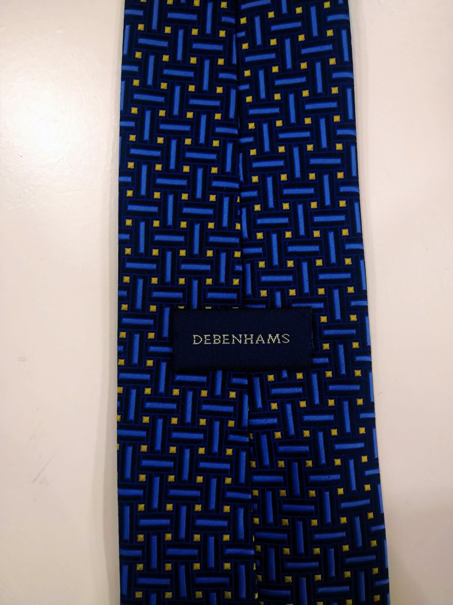 Debenhams polyester tie. Blue yellow motif.