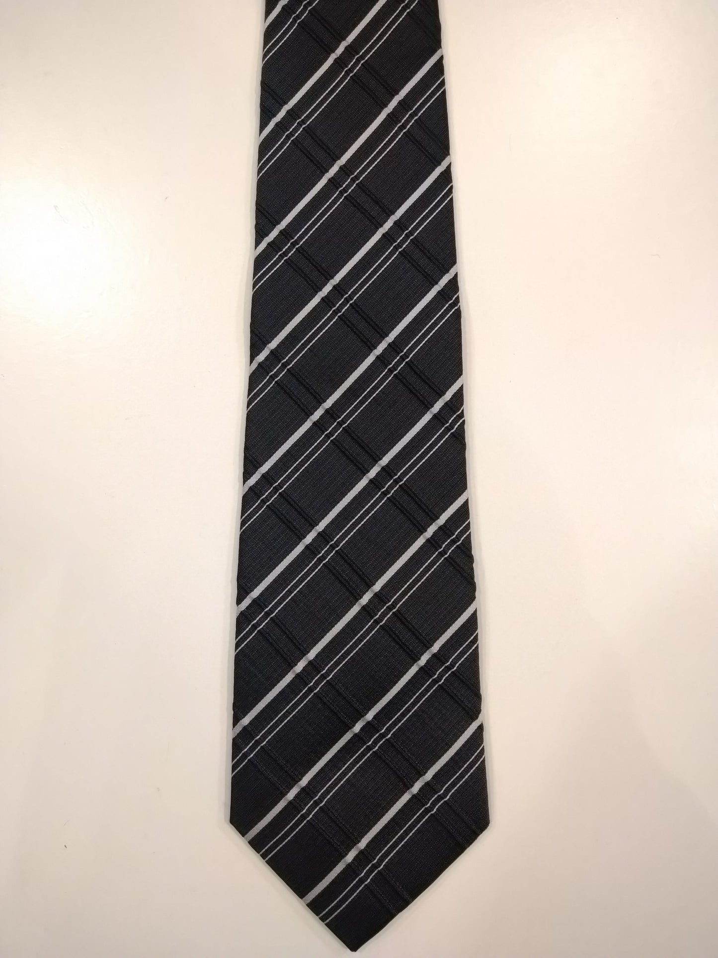Armando zijde stropdas. Mooi zwart grijs voelbaar motief