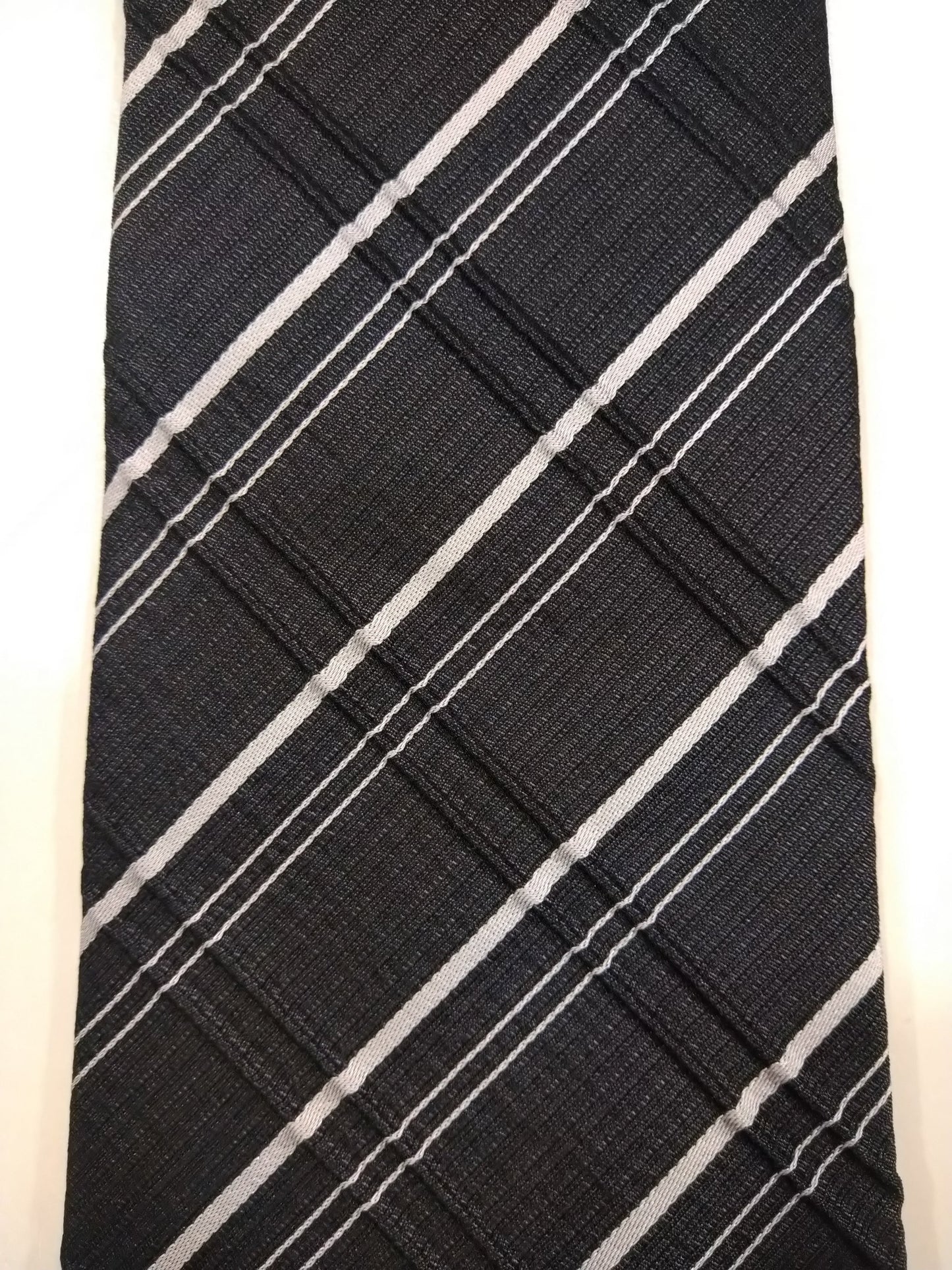 Armando zijde stropdas. Mooi zwart grijs voelbaar motief