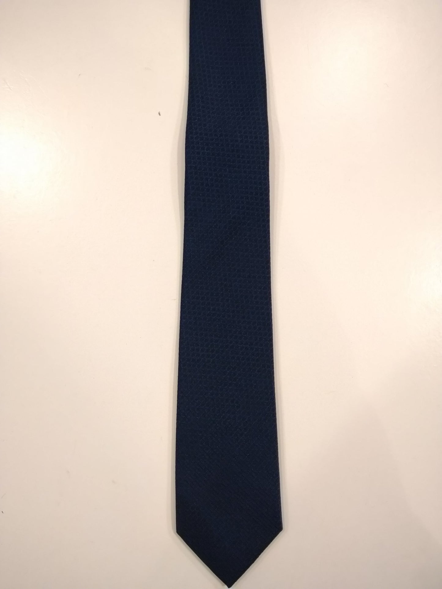 Next extra smalle polyester stropdas. Blauw motief.
