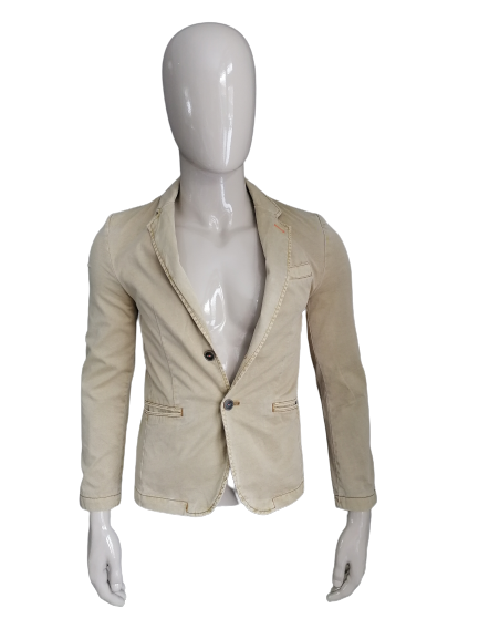 Review jacket. Light brown colored. Size XS