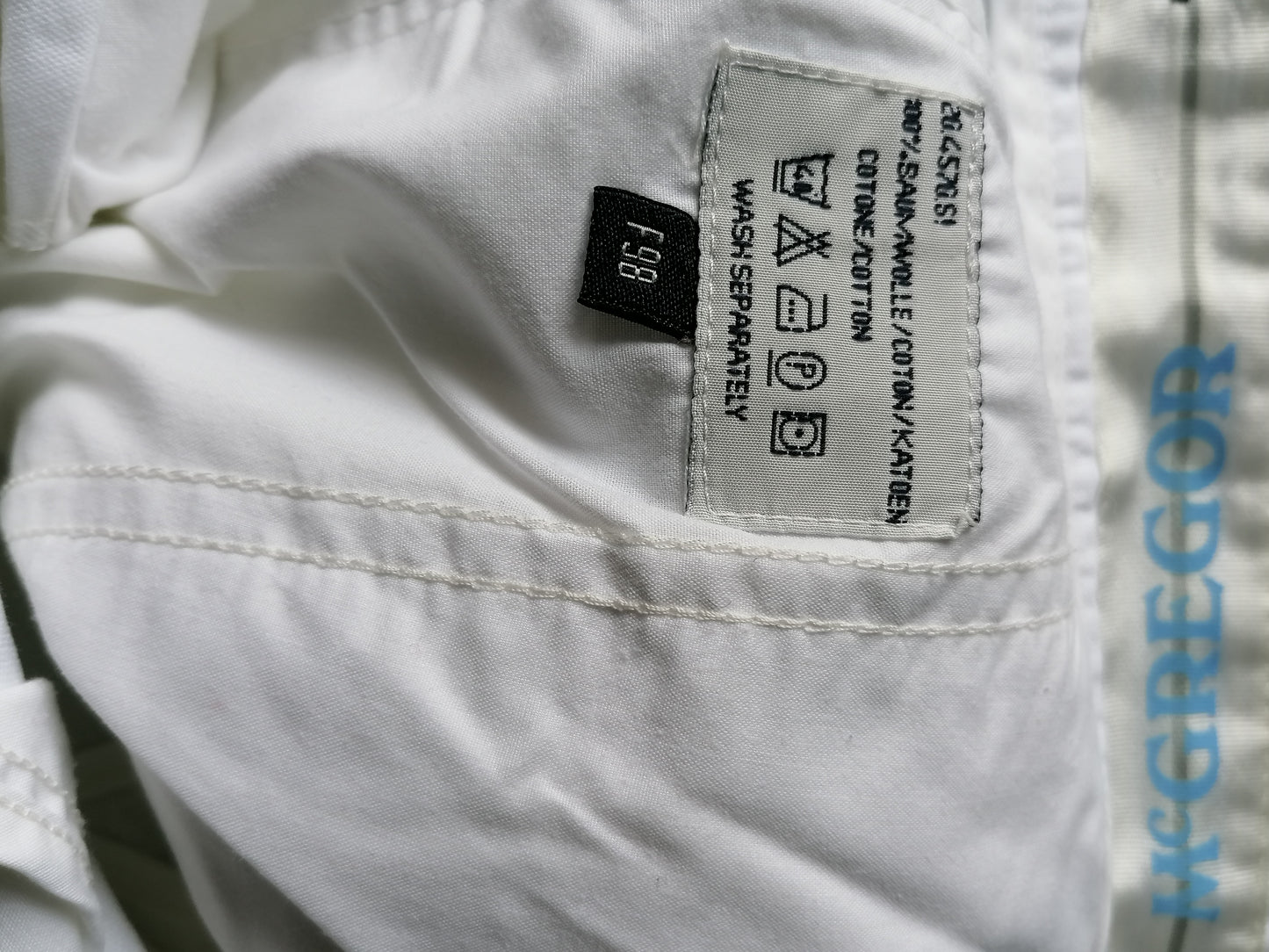 Pantalones McGregor. Blanco coloreado. El tamaño F98 se ve como las dimensiones iguales a un tamaño W31- L32.