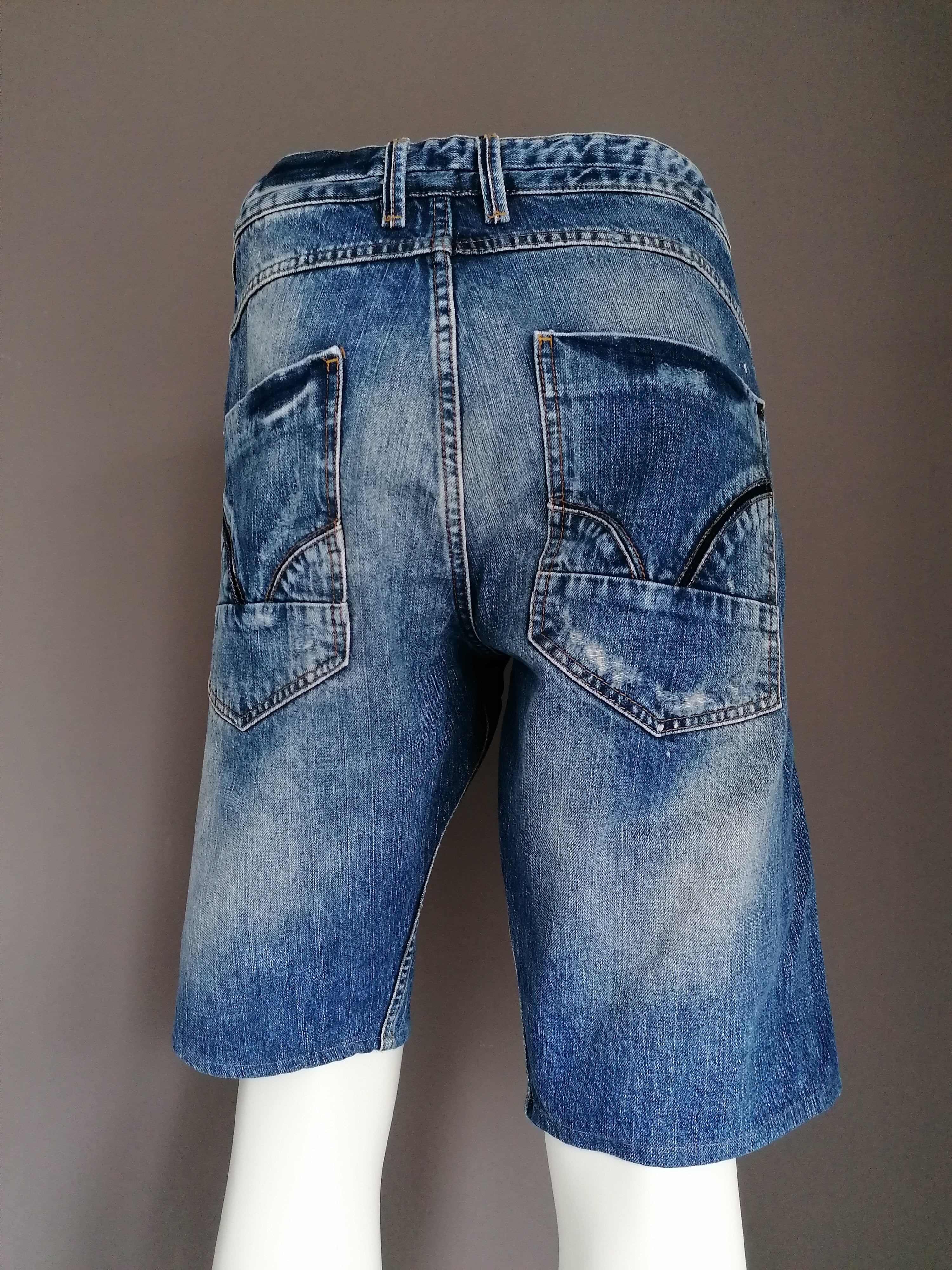 River Island jeans shorts. Colored blue. Size W38