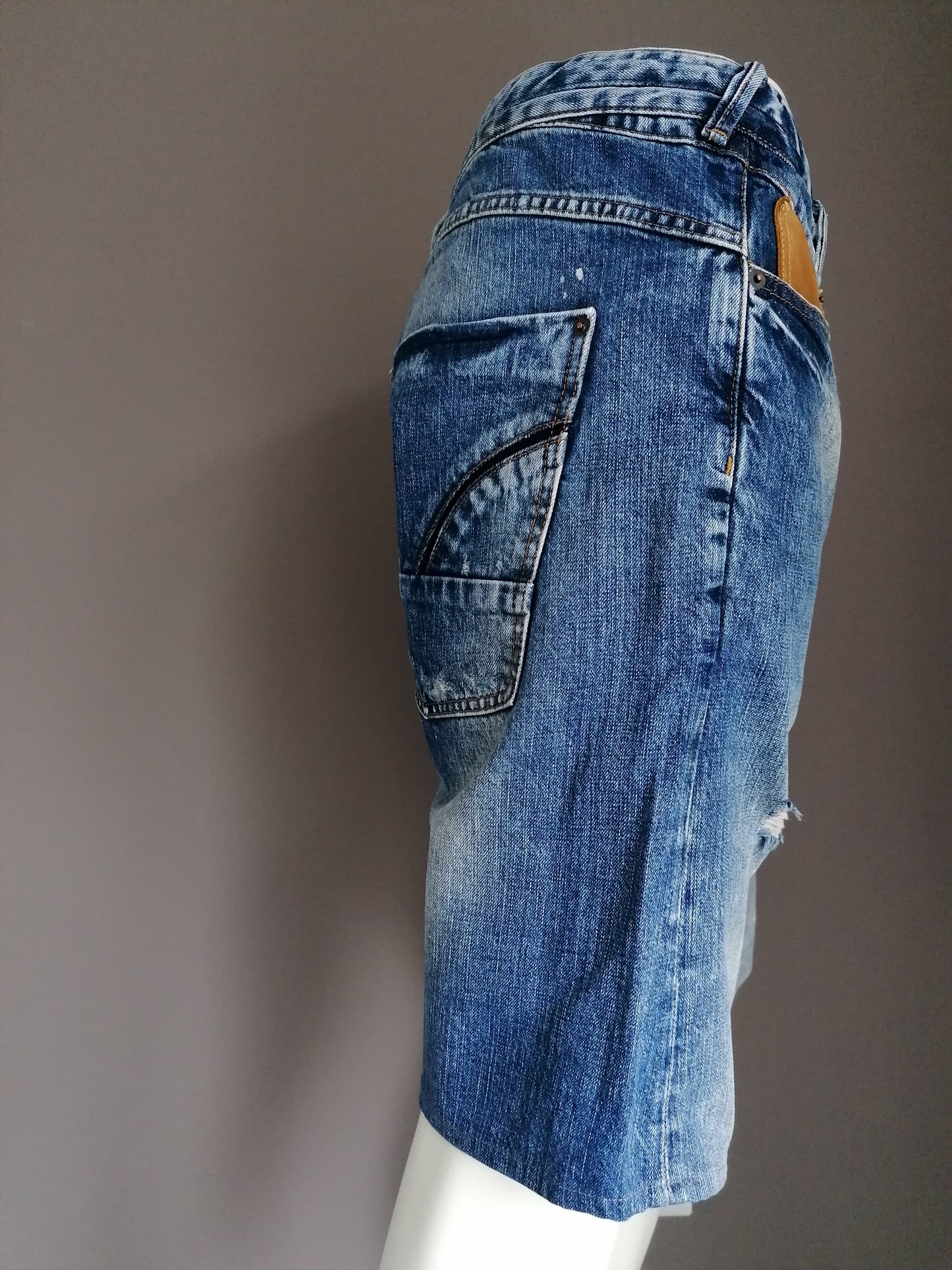 Pantalones cortos de jeans de la isla del río. Azul de color. Tamaño W38
