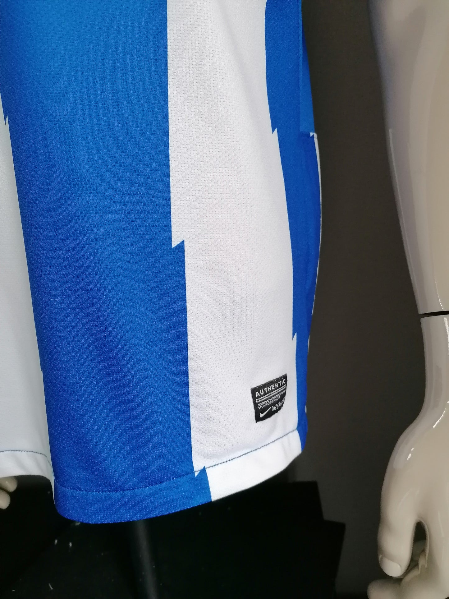 Nike voetbal sport shirt "Oroz". Blauw Wit motief. Maat L.