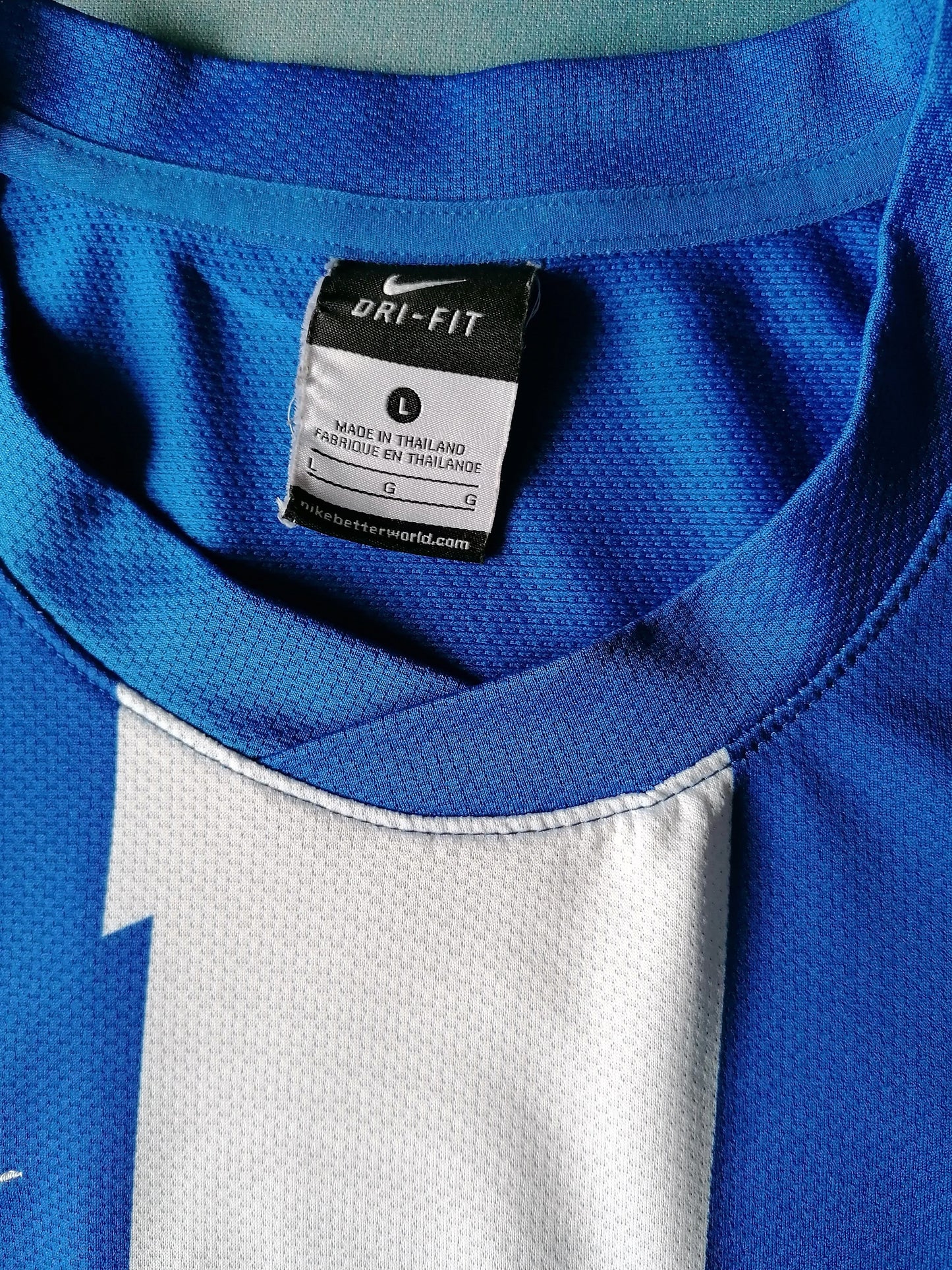 Camisa deportiva de Nike Soccer "Oroz". Motivo blanco azul. Talla L.