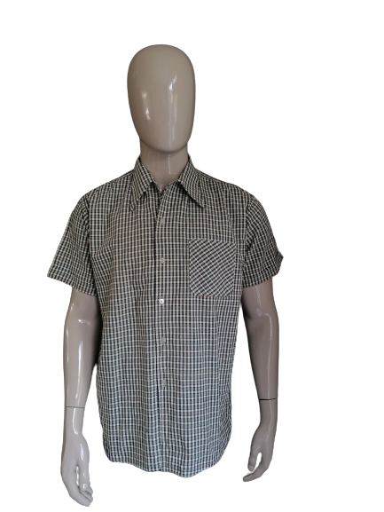 Vintage 70's short sleeve shirt with point collar. Size XL.