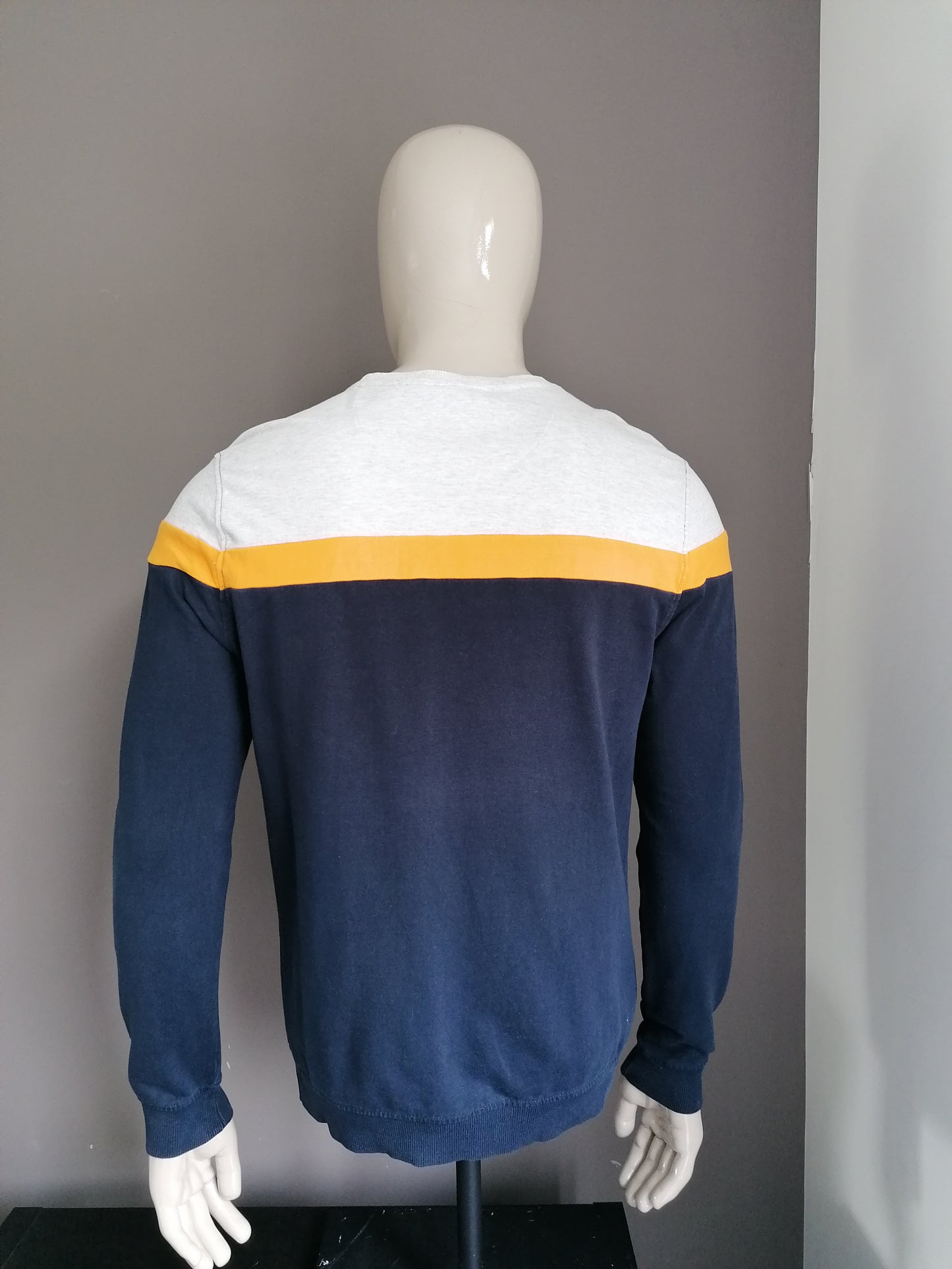 Suéter de recarga. Azul amarillo gris de color. Tamaño S / m