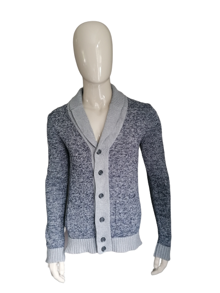We fashion cardigan with buttons. Blue gray mixed. Size M.