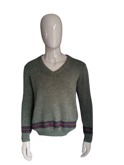 Vintage wool sweater with V-neck. Green colored. Size XL.