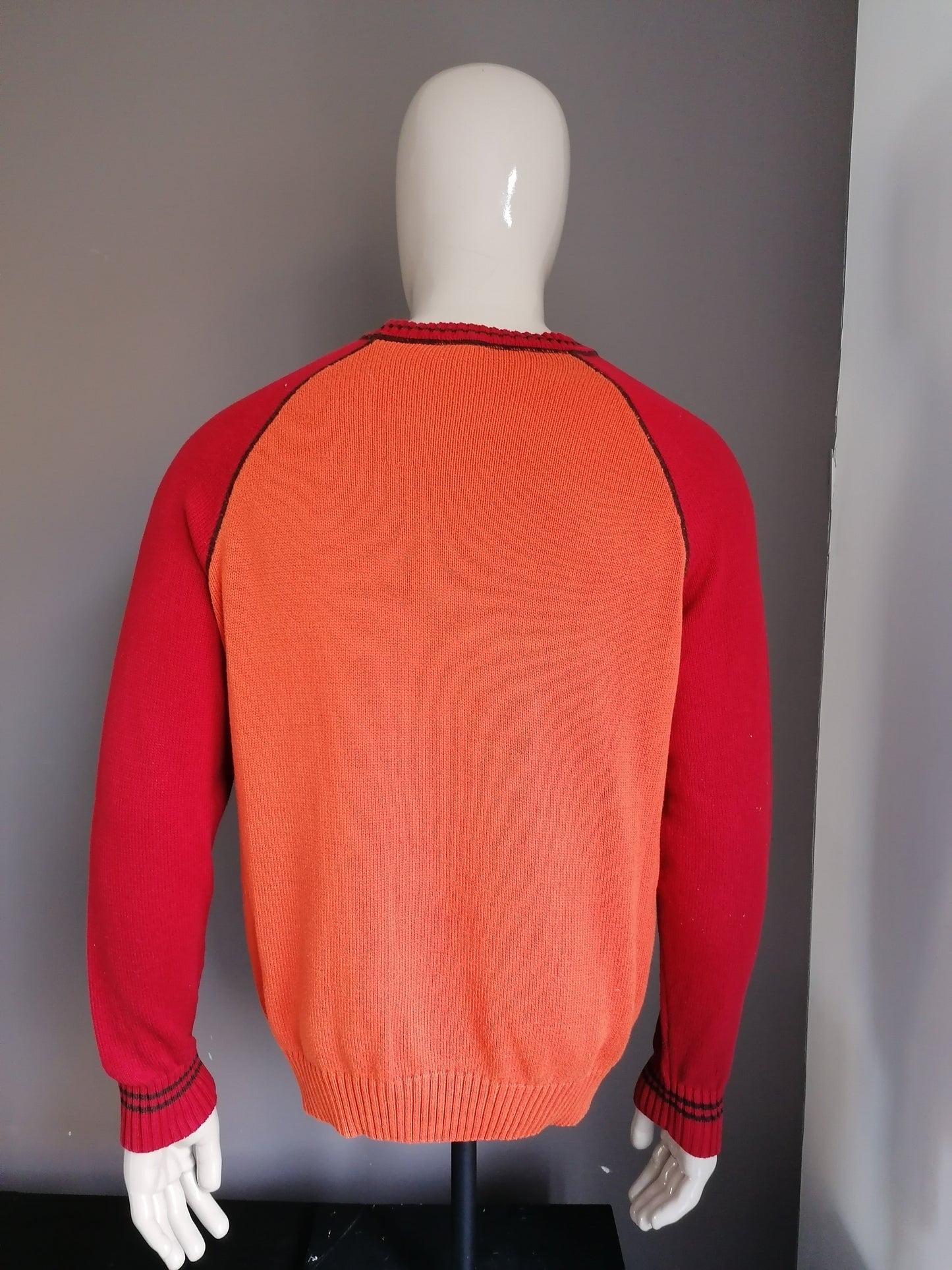 McNeal Sweater. Red colored orange. Size L.