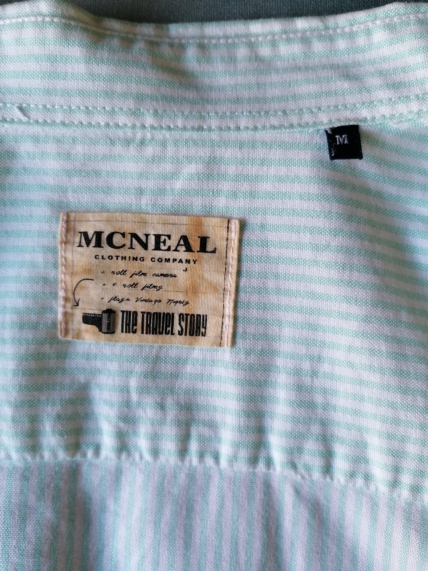 McNeal shirt. Green white striped. Size M.