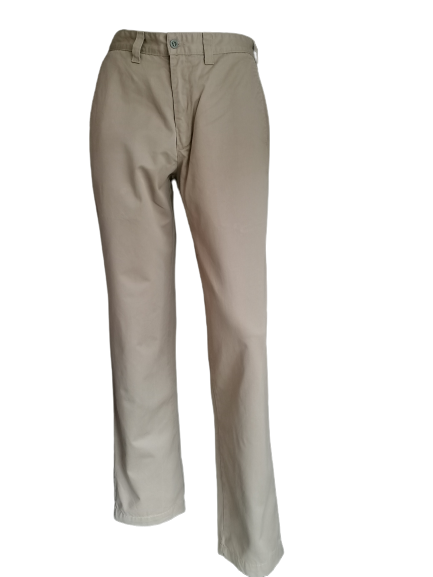 Dockers Khaki Pants. Coloreado de color beige. Tamaño W32 - L36